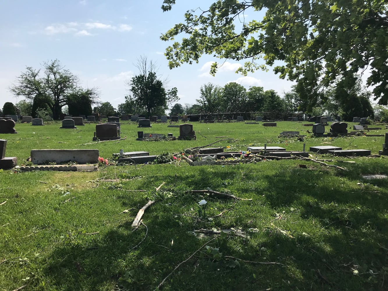 PHOTOS: Tornado-damaged communities dig out, clean up