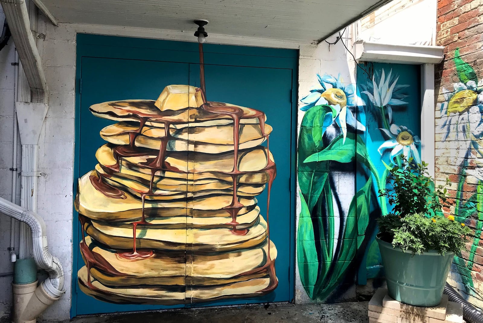 A breakfast-themed mural has been created on Butter Café, 1106 Brown St. SARAH FRANKS / STAFF