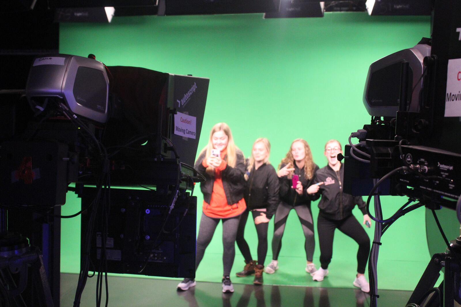 Oakwood High School sophomores ( left to right)  Dana Clark and Zoe Waller, Claire Parker and Ryann Mescher launched the Femme Aid Collaborative to  address period poverty in the Dayton area. They are pictured in the WHIO studio.