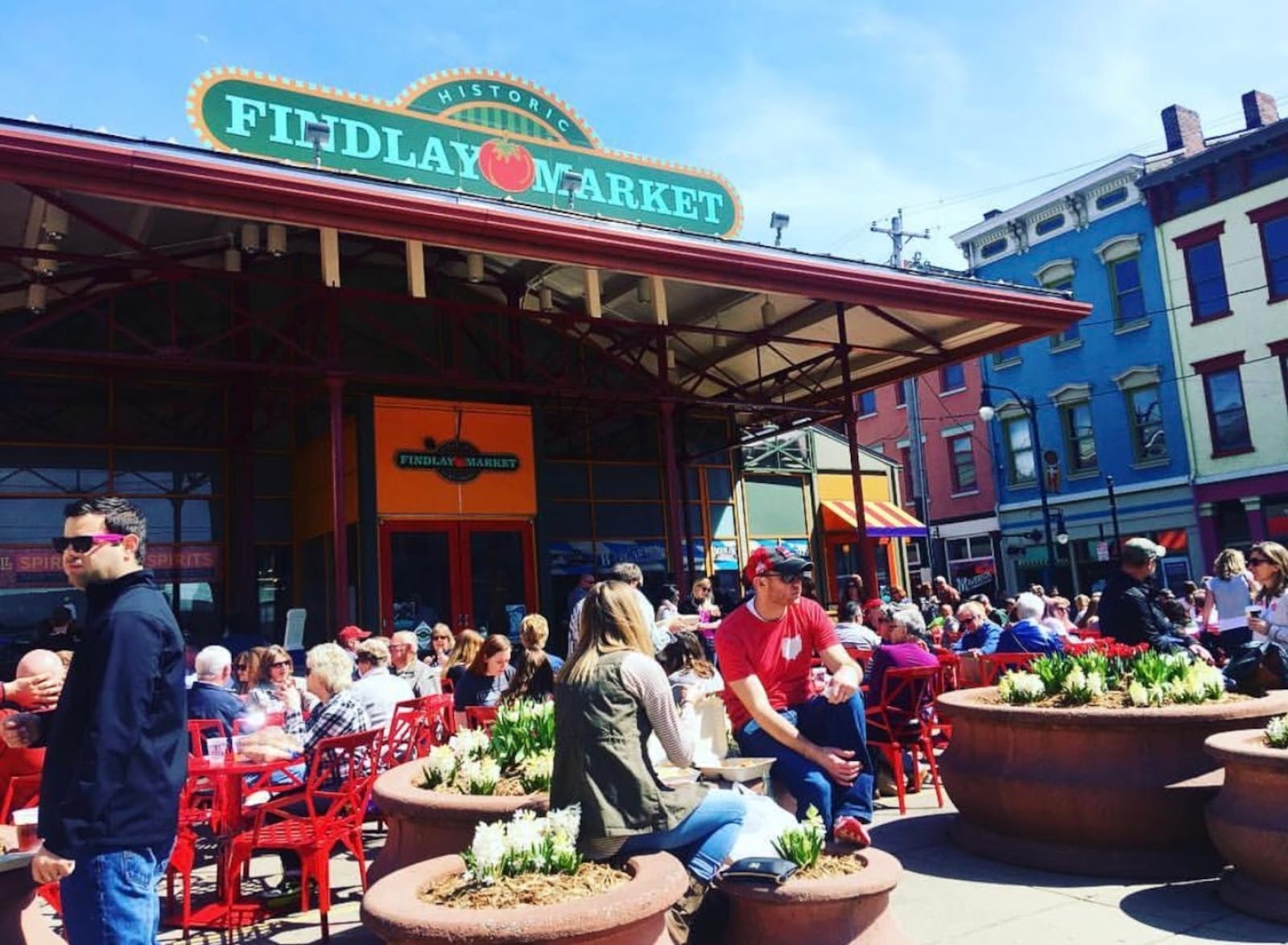 Findlay Market in Cincinnati is bustling with food vendors, a bier garden and live music on weekends. KARA DRISCOLL/STAFF