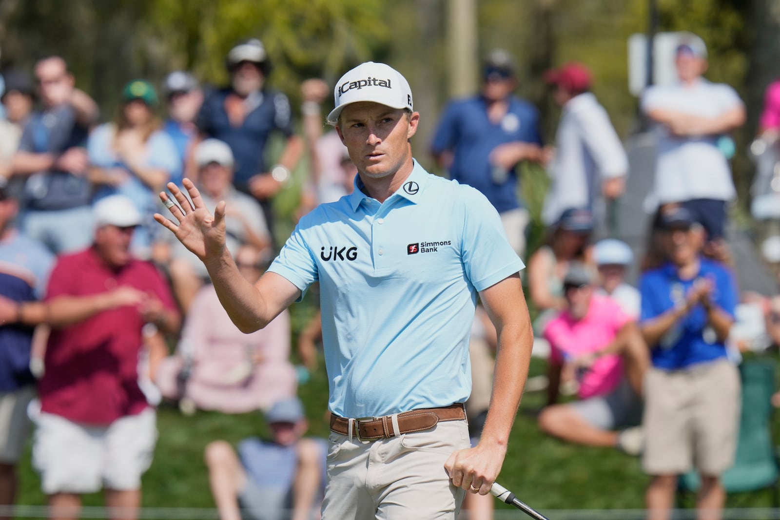 Will Zalatoris waves after making a birdie on fifth hole during the third round of The Players Championship golf tournament Saturday, March 15, 2025, in Ponte Vedra Beach, Fla. (AP Photo/Chris O'Meara)