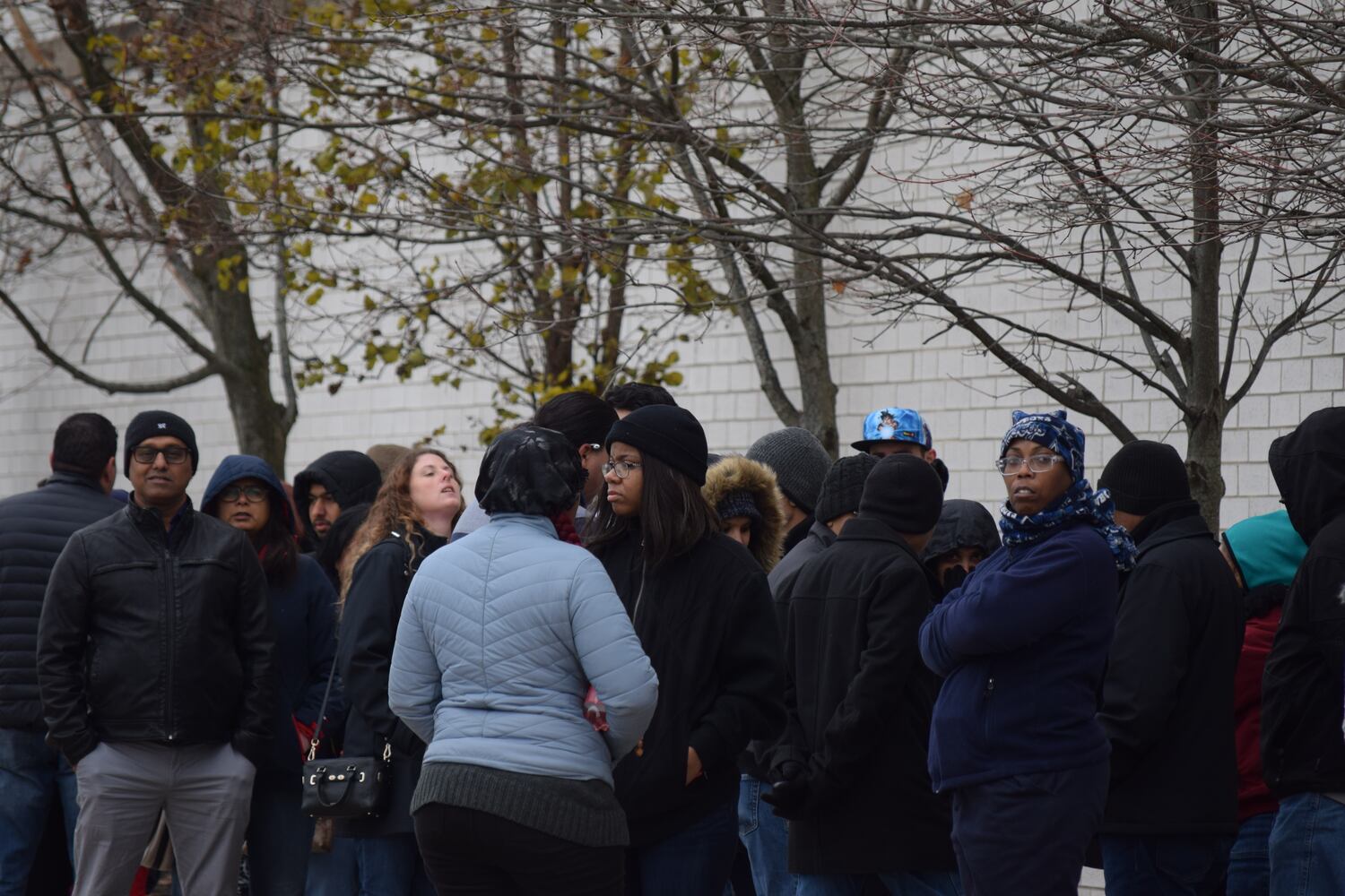 PHOTOS: Hundreds like up outside JCPenney for doorbusters, coupons