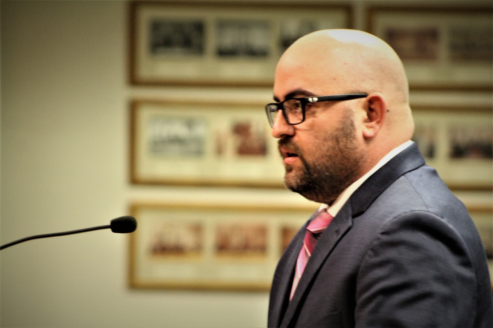 Stephen Post, vice president of the Dayton Firefighters Local 136, speaks at the Dayton City Commission meeting this week. CORNELIUS FROLIK / STAFF