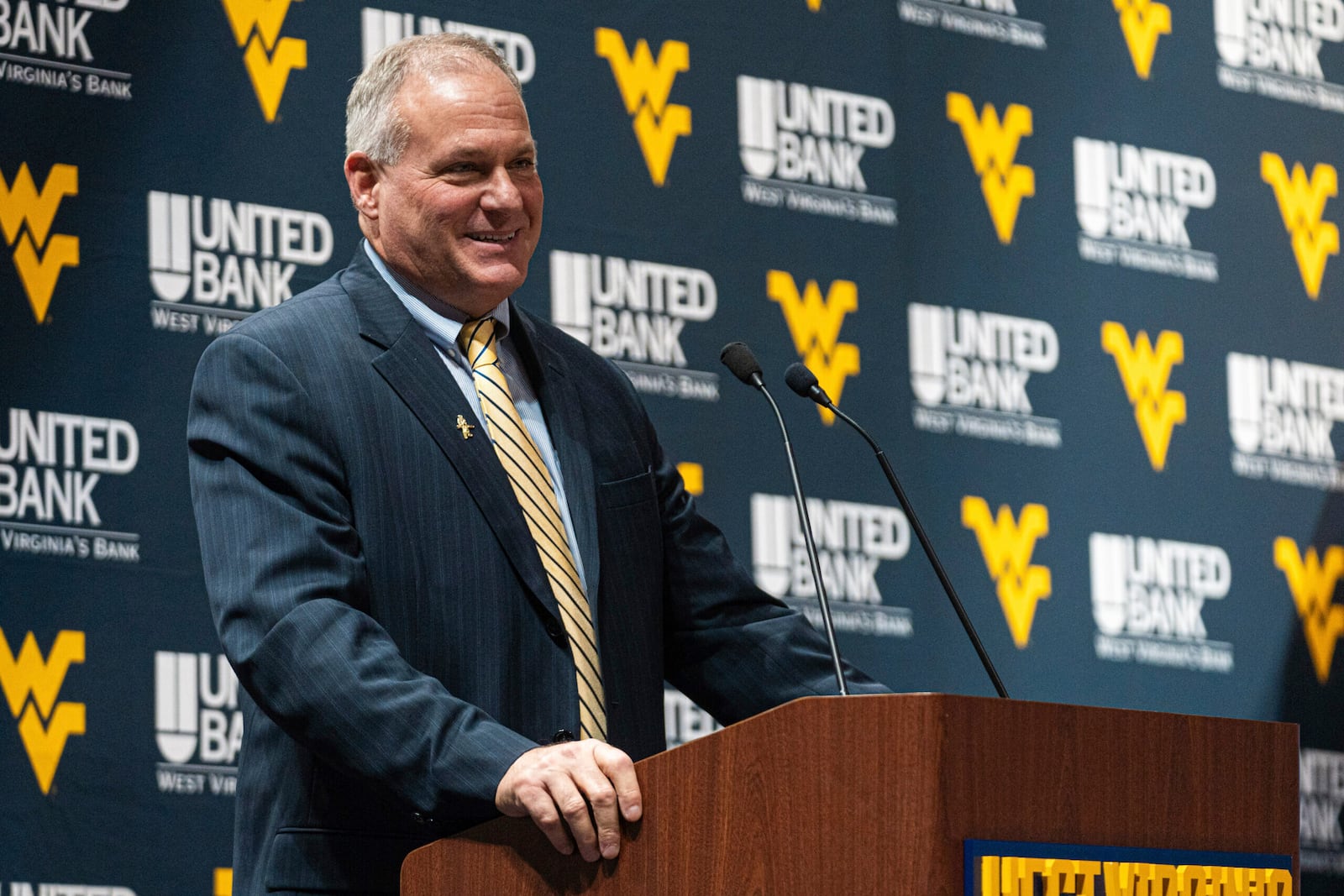 West Virginia coach Rich Rodriguez speaks during an introductory NCAA college football news conference Friday, Dec. 13, 2024, in Morgantown, W.Va. (Benjamin Powell/The Dominion-Post via AP)