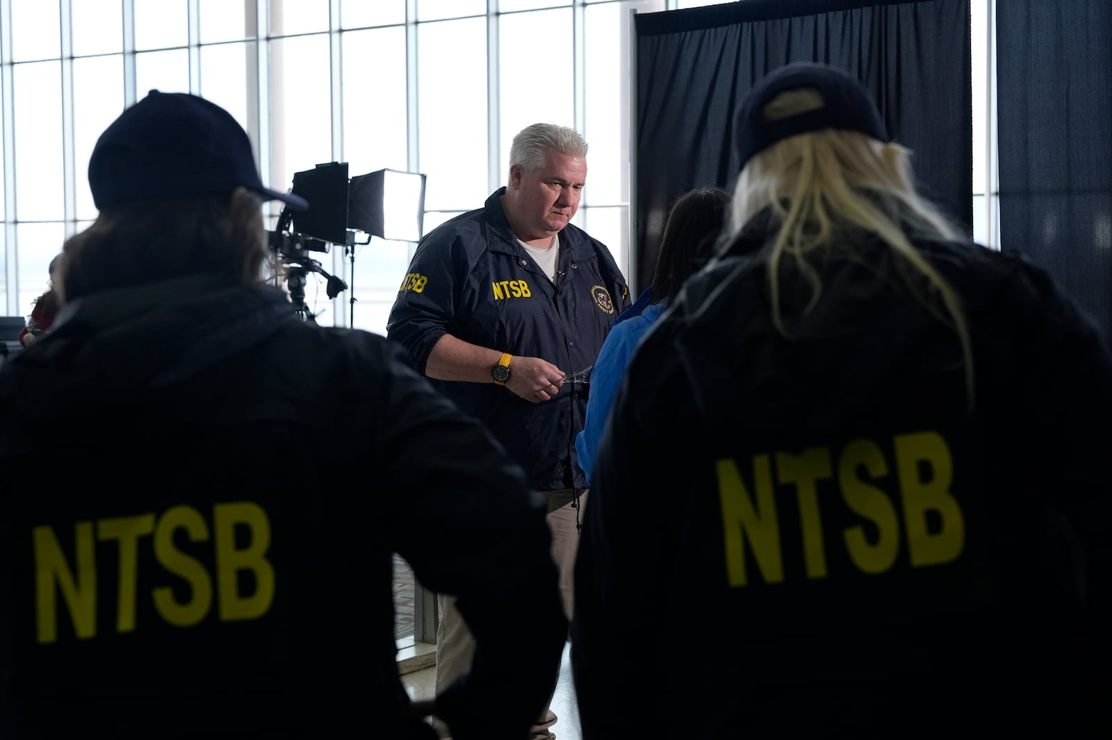 National Transportation Safety Board member Todd Inman speaks with reporters at Ronald Reagan Washington National Airport, Friday, Jan. 31, 2025, in Arlington, Va. (AP Photo/Alex Brandon)