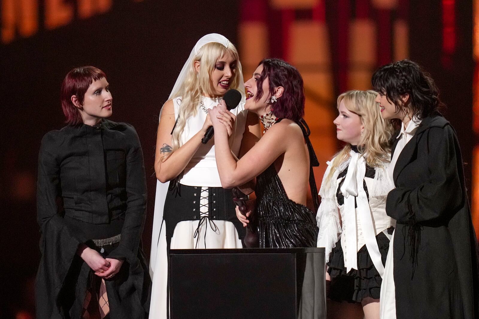 Lizzie Mayland, from left, Georgia Davies, Aurora Nishevci, Emily Roberts and Abigail Morris, from the group 'The Last Dinner Party', accept the best new artist award during the Brit Awards 2025 in London, Saturday, March.1, 2025. (Photo by Scott A Garfitt/Invision/AP)