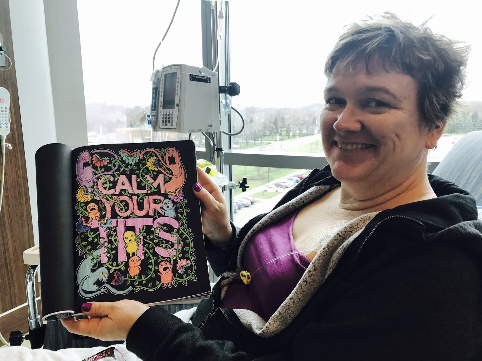 On March 1, during her first time receiving chemo at the Kettering Cancer Center, Kristen Wicker colored what she felt was a very appropriate page in her dirty words coloring book. CONTRIBUTED