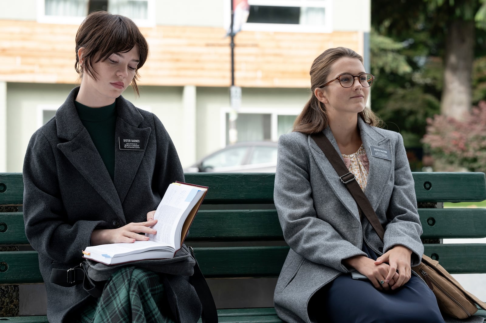 This image released by A24 shows Sophie Thatcher, left, and Chloe East in a scene from "Heretic." (Kimberley French/A24 via AP)