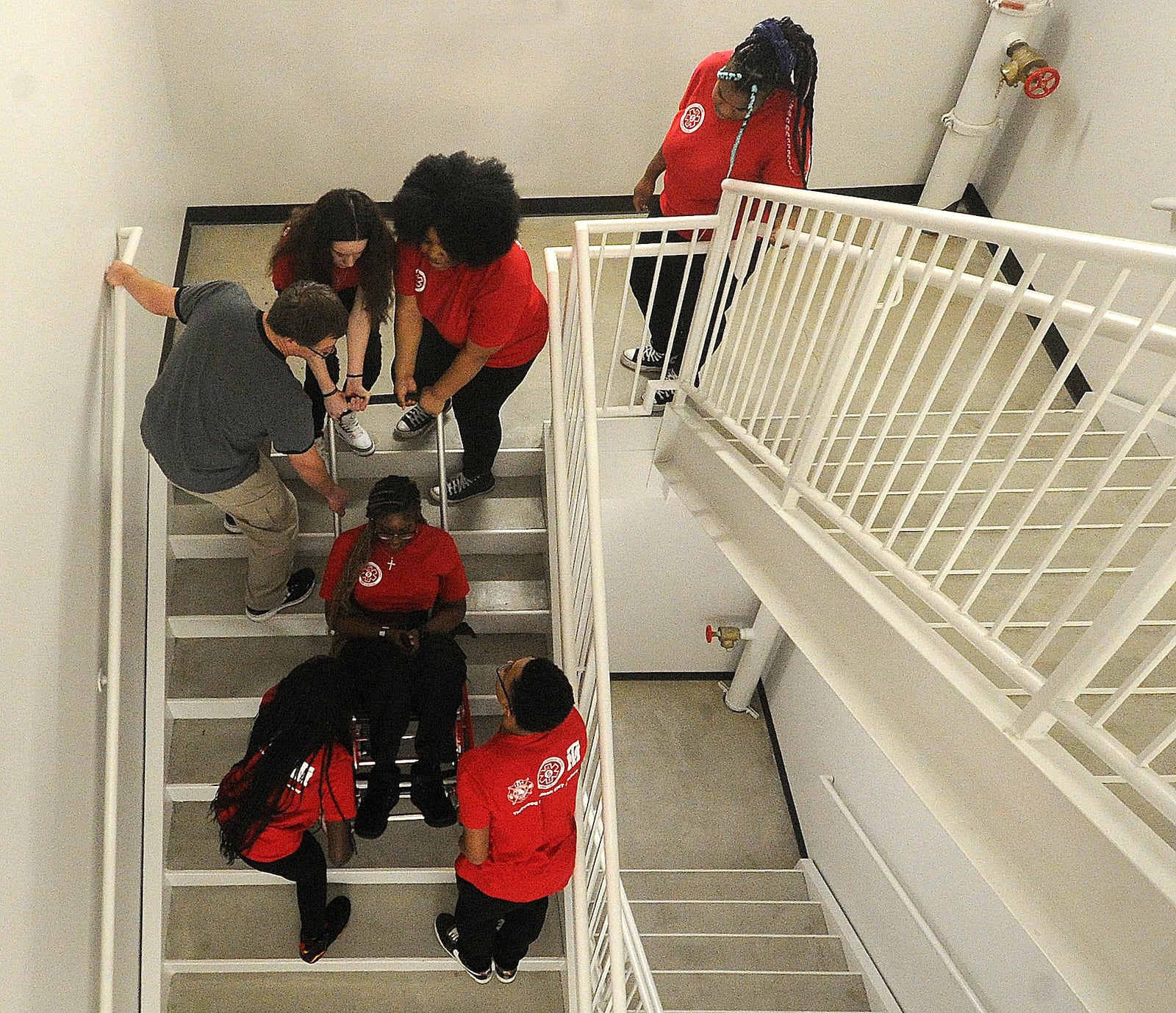 Trotwood High School students participate in a lab Tuesday, Feb. 13, 2024 as part of the Sinclair Emergency Medical Services Program. MARSHALL GORBY\STAFF