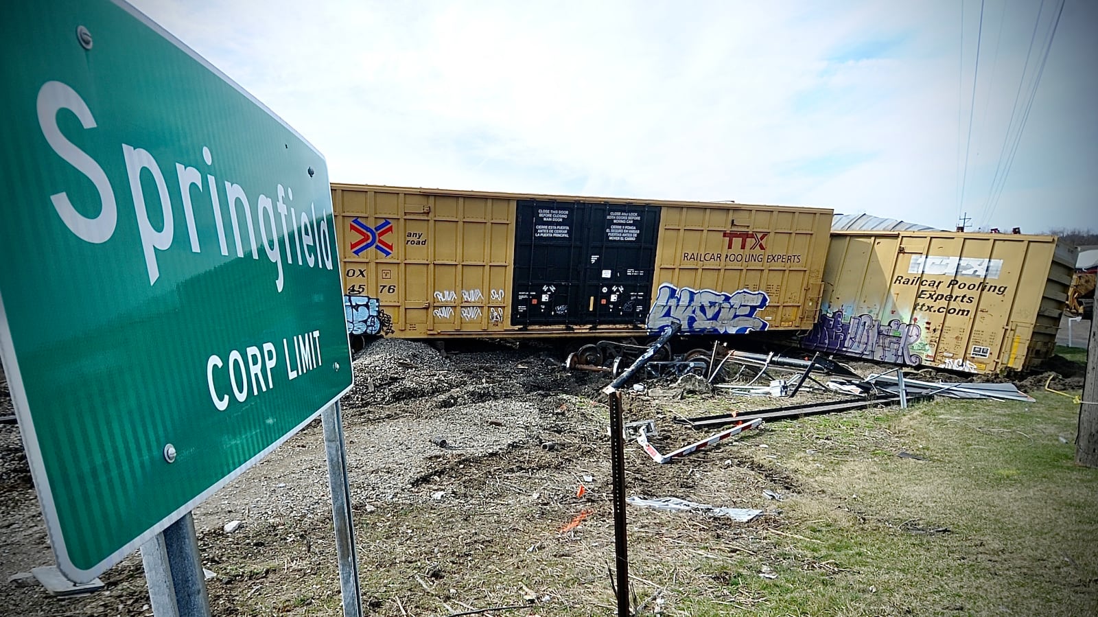 Cleanup crews work to remove the rail cars from a Norfolk Southern train derailment along Ohio 41 near the Clark county fairgrounds Sunday morning March 5, 2023. MARSHALL GORBY \STAFF