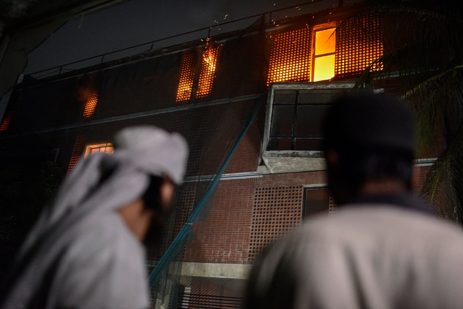 Protesters vandalize the residence of Sheikh Mujibur Rahman, Bangladesh's former leader and the father of the country's ousted Prime Minister Sheikh Hasina, at Dhanmondi, in Dhaka in Dhaka, Bangladesh, Wednesday, Feb. 5, 2025. (AP Photo/Mahmud Hossain Opu)