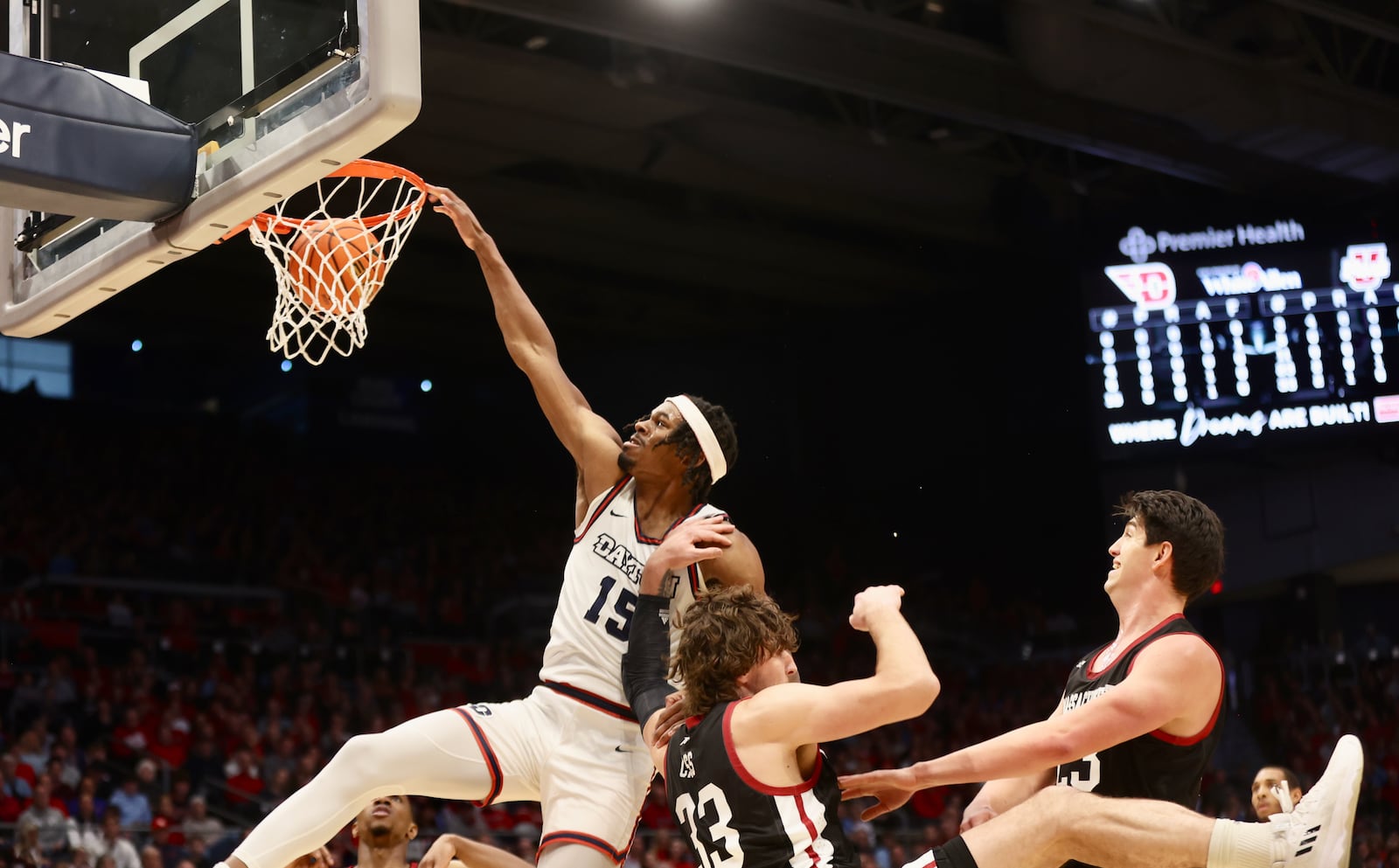 Dayton's DaRon Holmes II dunks against Massachusetts on Sunday, Jan. 7, 2024, at UD Arena. David Jablonski/Staff