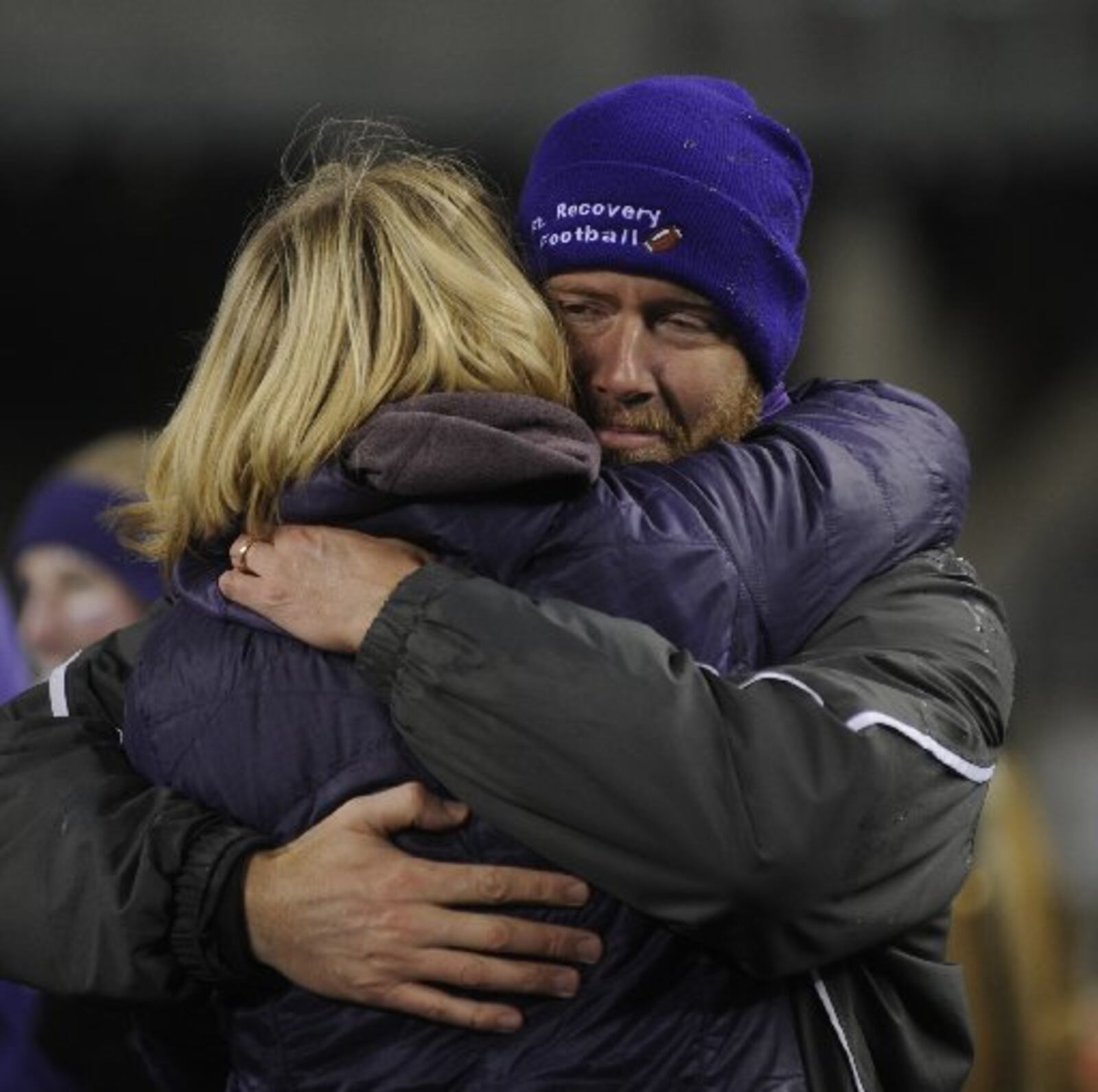 Fort Recovery head coach Brent Niekamp savors the school's first state title with his wife Kim. Fort Recovery defeated Mogadore 33-14 to win the high school football D-VII state championship at Ohio Stadium in Columbus on Friday, Dec. 4, 2015. MARC PENDLETON / STAFF