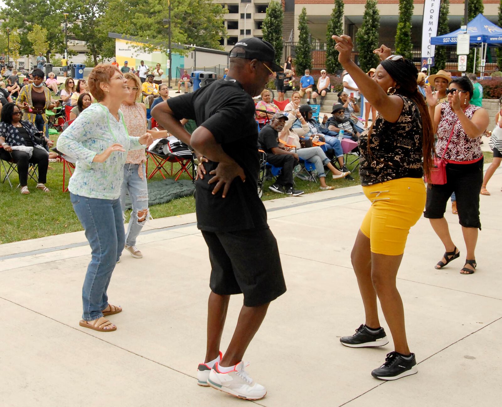 Patrons join forces to dance to the grooves of last year's Dayton Funk Festival. The event returns Sunday, Aug. 14 at Levitt Pavilion in downtown Dayton. CONTRIBUTED/DAVID A. MOODIE