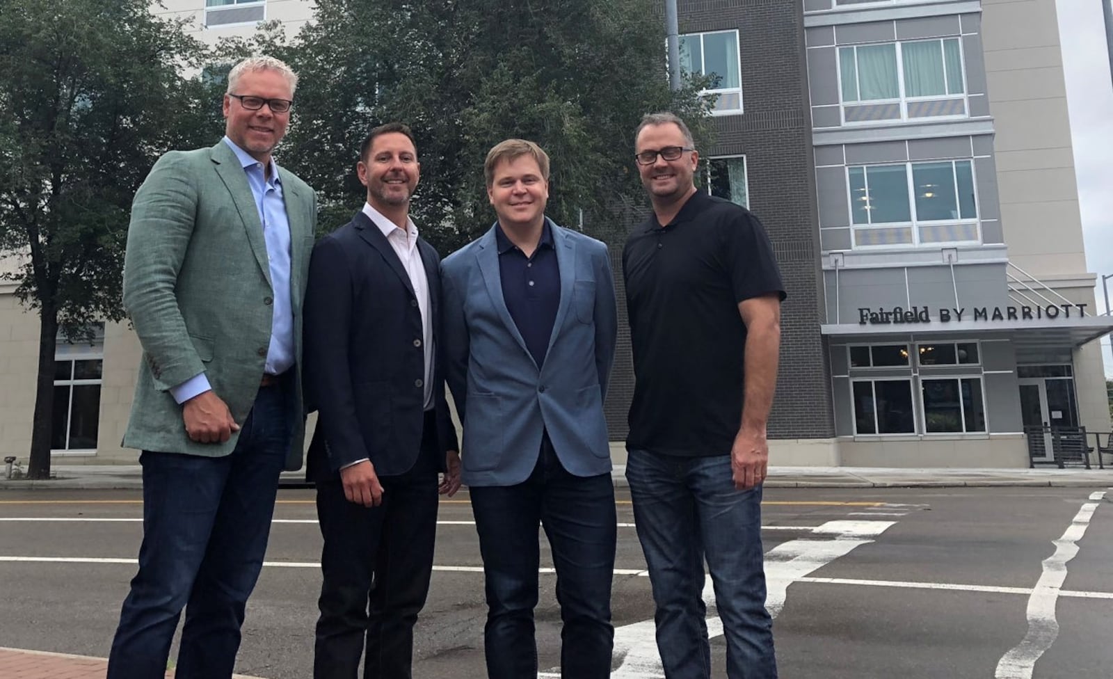 From left to right: Bob Hoying, Brent Crawford, Nelson Yoder and Jason Woodard.  Hoying, Crawford and Yoder are principals with Crawford Hoying. Crawford Hoying and Woodard Development are the developers of the Water Street District and the new Fairfield Inn & Suites by Marriott.  CORY FROLIK / STAFF