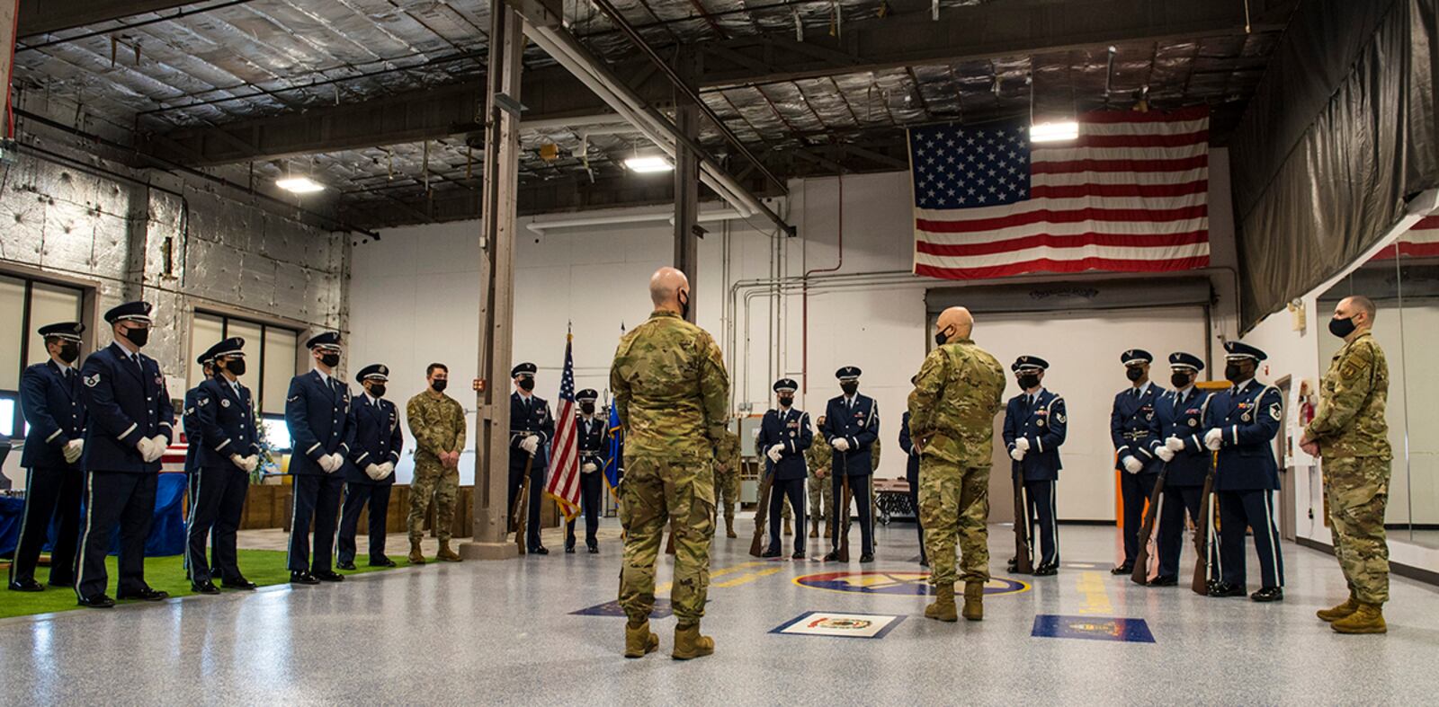 Gen. Arnold W. Bunch, Jr. (right), Air Force Materiel Command commander, and Chief Master Sgt. David Flosi (left), AFMC command chief, speak with Airmen attached to the 88th Air Base Wing Honor Guard at Wright-Patterson Air Force Base on Jan. 21. Bunch and Flosi visited the 88th ABW to discuss diversity, equality, inclusion and accessibility efforts and visit the medical center, 13M training facility, honor guard and civil engineering center. U.S. AIR FORCE PHOTO/JAIMA FOGG