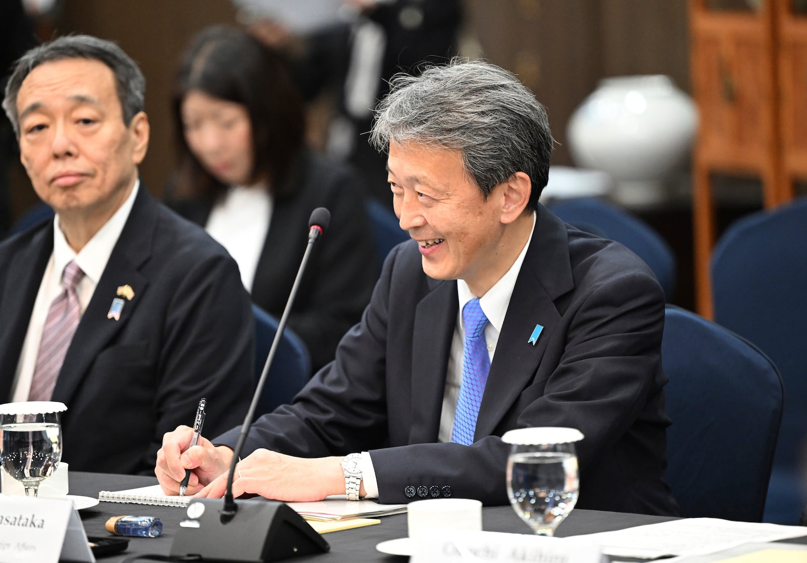 Japan's Vice Foreign Minister Masataka Okano, right, attends a trilateral meeting with South Korea's First Vice Foreign Minister Kim Hong-kyun, unseen, and United States Deputy Secretary of State Kurt Campbell, unseen, at the Foreign Ministry in Seoul Wednesday, Oct. 16, 2024. (Jung Yeon-je/Pool Photo via AP)