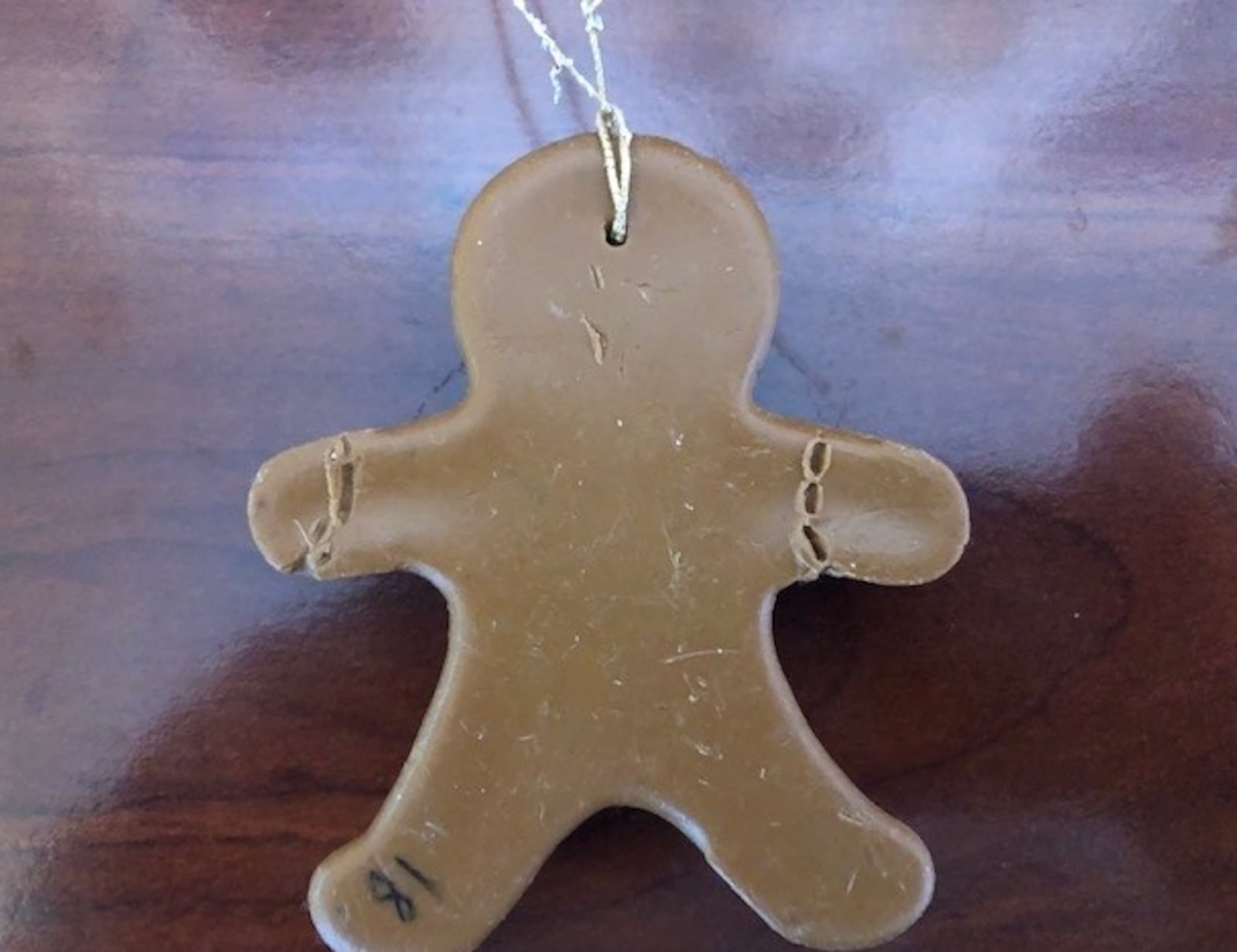 Rick Chamberlin of Centerville shared that his oldest son, Jason, took a bite out of a gingerbread man ornament (pictured) hanging on the tree when he was three years old.