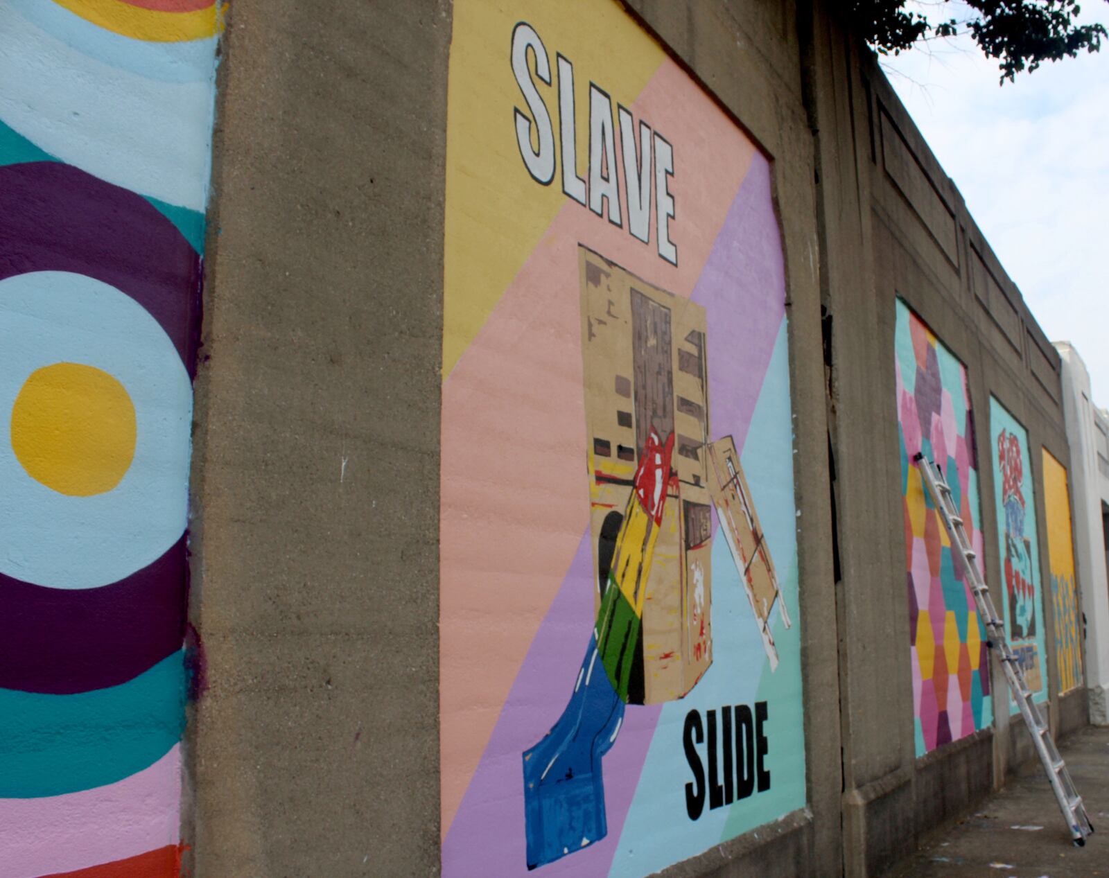 Dayton artist Morris Howard and Brittini Long of Montgomery County Juvenile Court are leading an effort to create a funk wall on Stone Street.