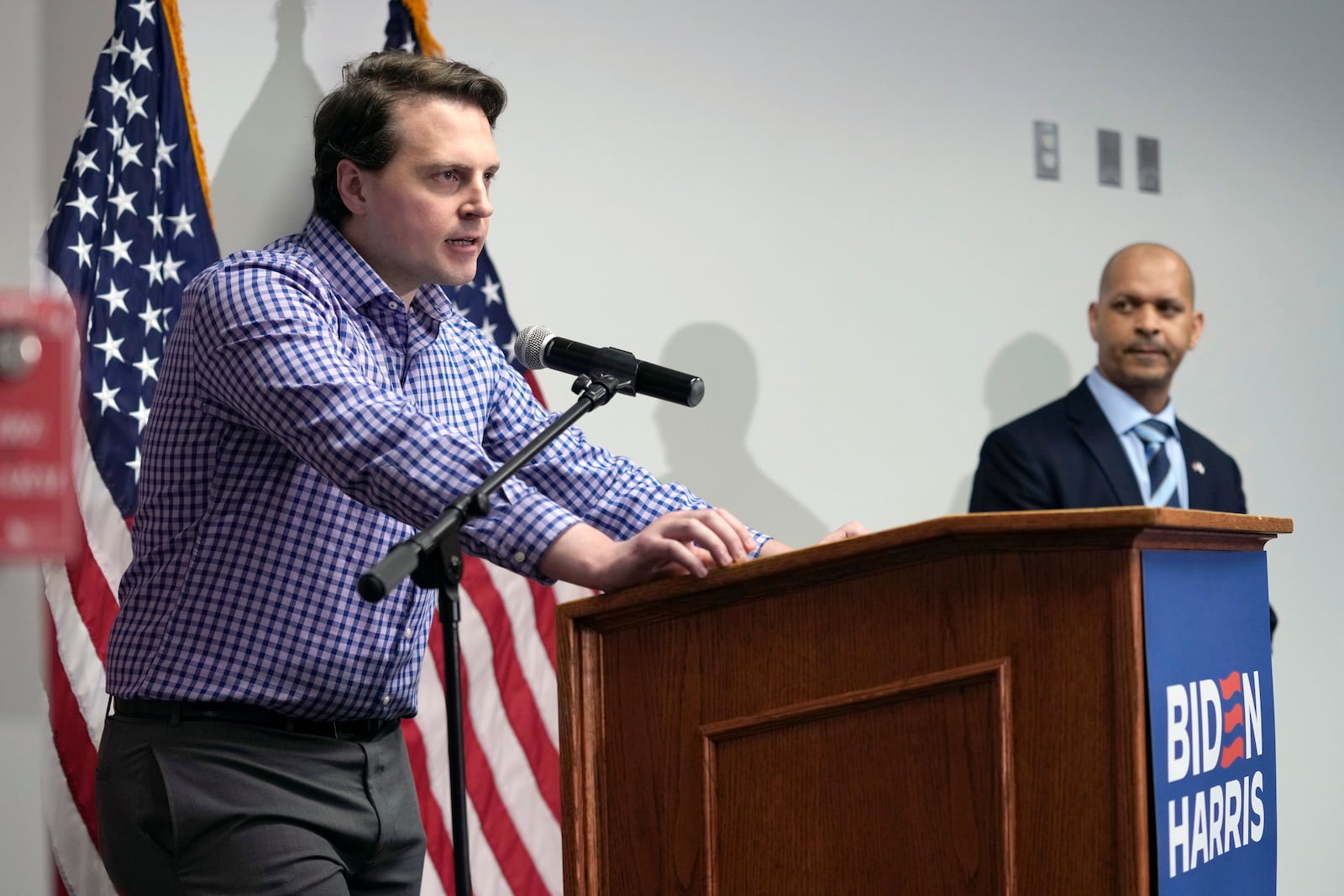 FILE - Former Capitol Police Sergeant Aquilino Gonell, right, listens as Metropolitan Police Officer Daniel Hodges speaks during a news conference in Washington, April 1, 2024. (AP Photo/Susan Walsh, File)