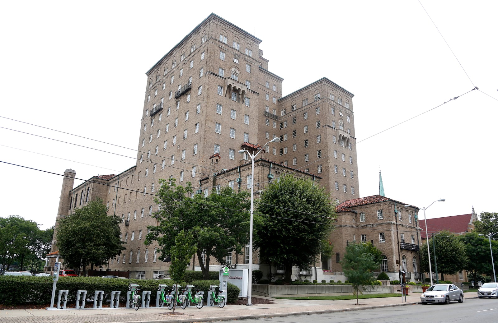 The downtown branch of the YMCA of Greater Dayton, one of 11 locations throughout the Miami Valley, is housed in a portion of the building dedicated in 1929. Today the building is also home to The Landing Apartments. LISA POWELL / STAFF