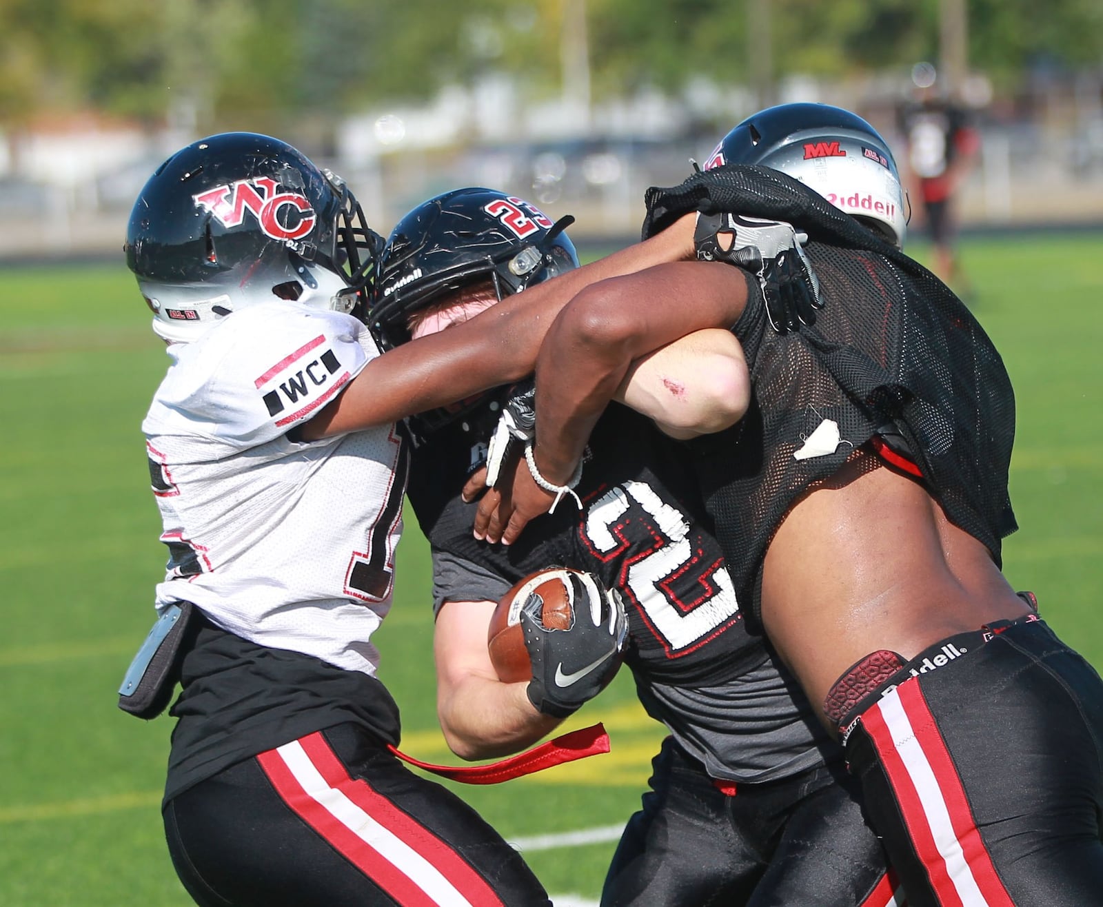 West Carrollton High School football players participate in a drill during practice on Wednesday, Oct. 9, 2019. MARC PENDLETON / STAFF