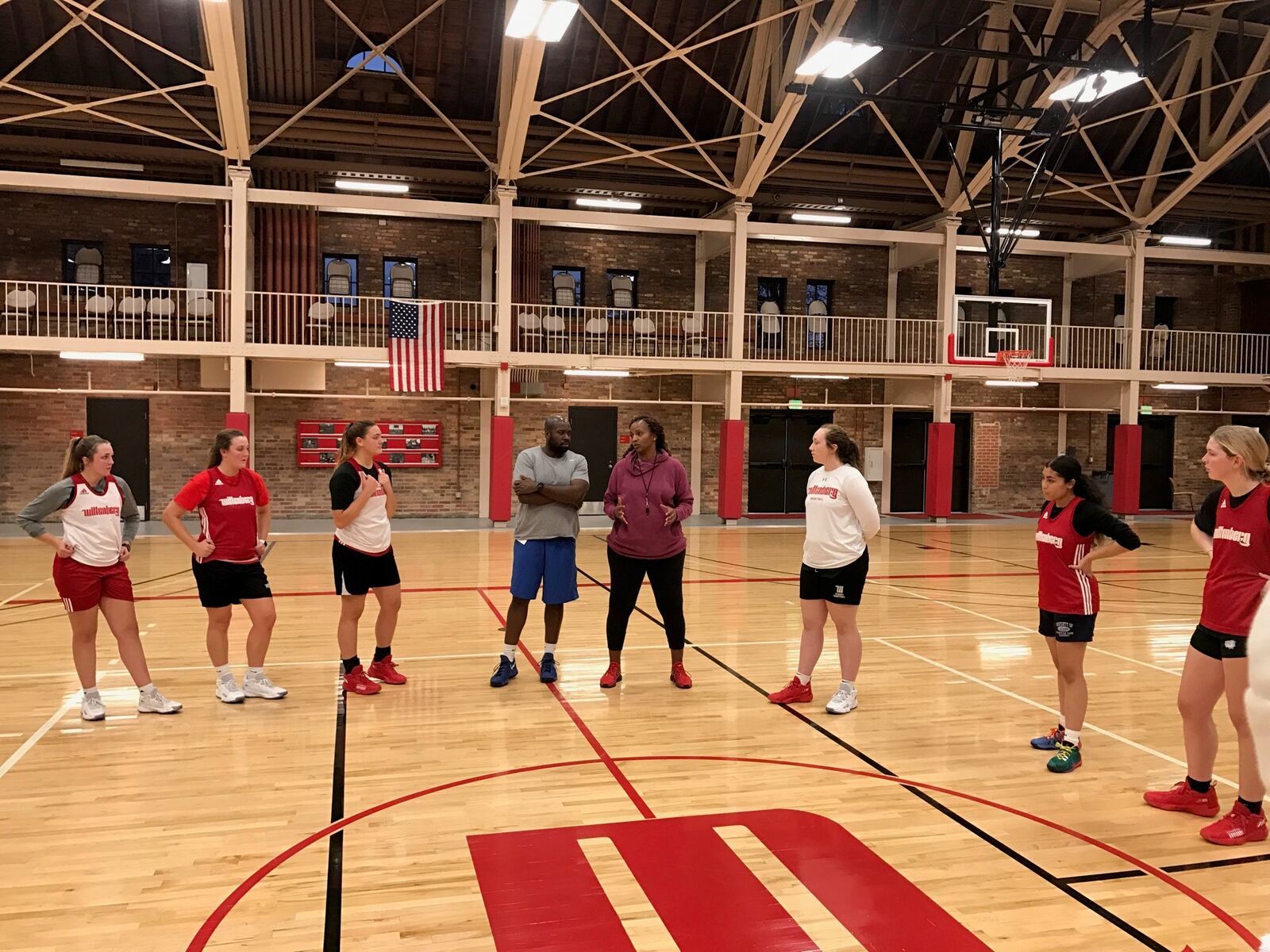 New Wittenberg women’s basketball coach Tamika Williams Jeter talks to her assistant coach, Trendale Perkins, the former Sinclair Community College women’s coach and one-time Patterson Co-Op star, at end of the Tigers’ practice the other day. The team opens the season Nov. 12 against Illinois Wesleyan at Wittenberg. Tom Archdeacon/STAFF