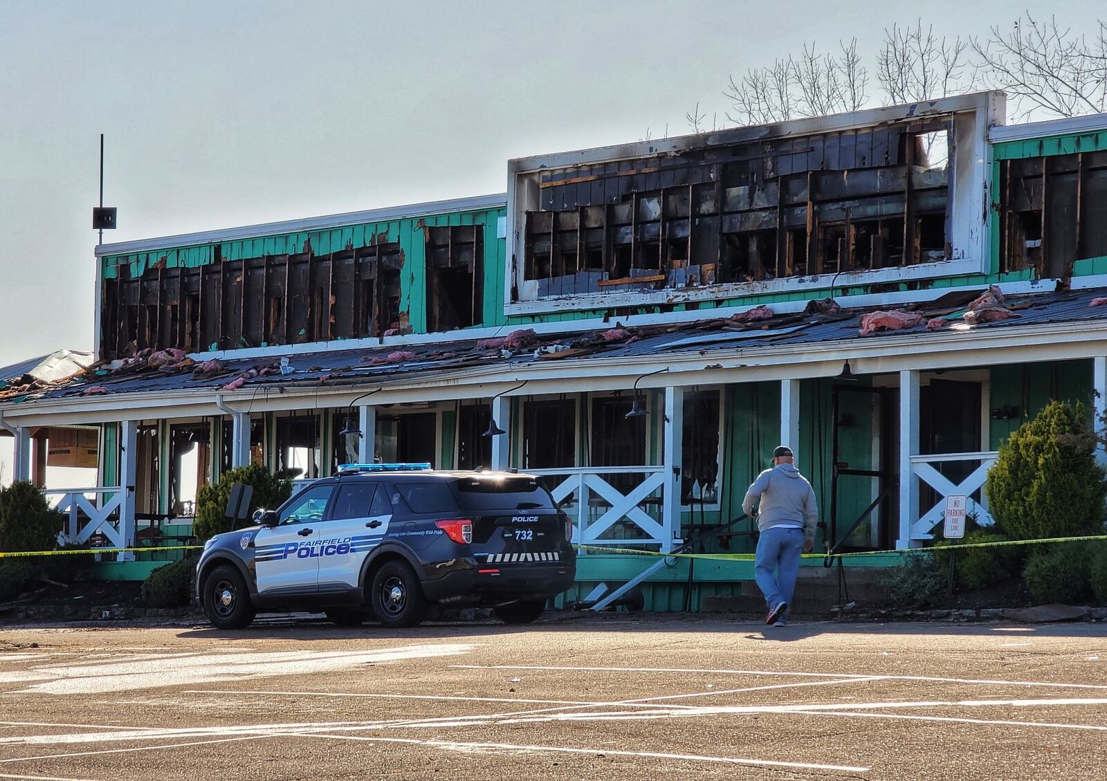 Fairfield fire units remain on the scene at Mango's Tropical Oasis on Dixie Highway after an early morning fire. Fire officials say the building is a total loss. NICK GRAHAM/STAFF