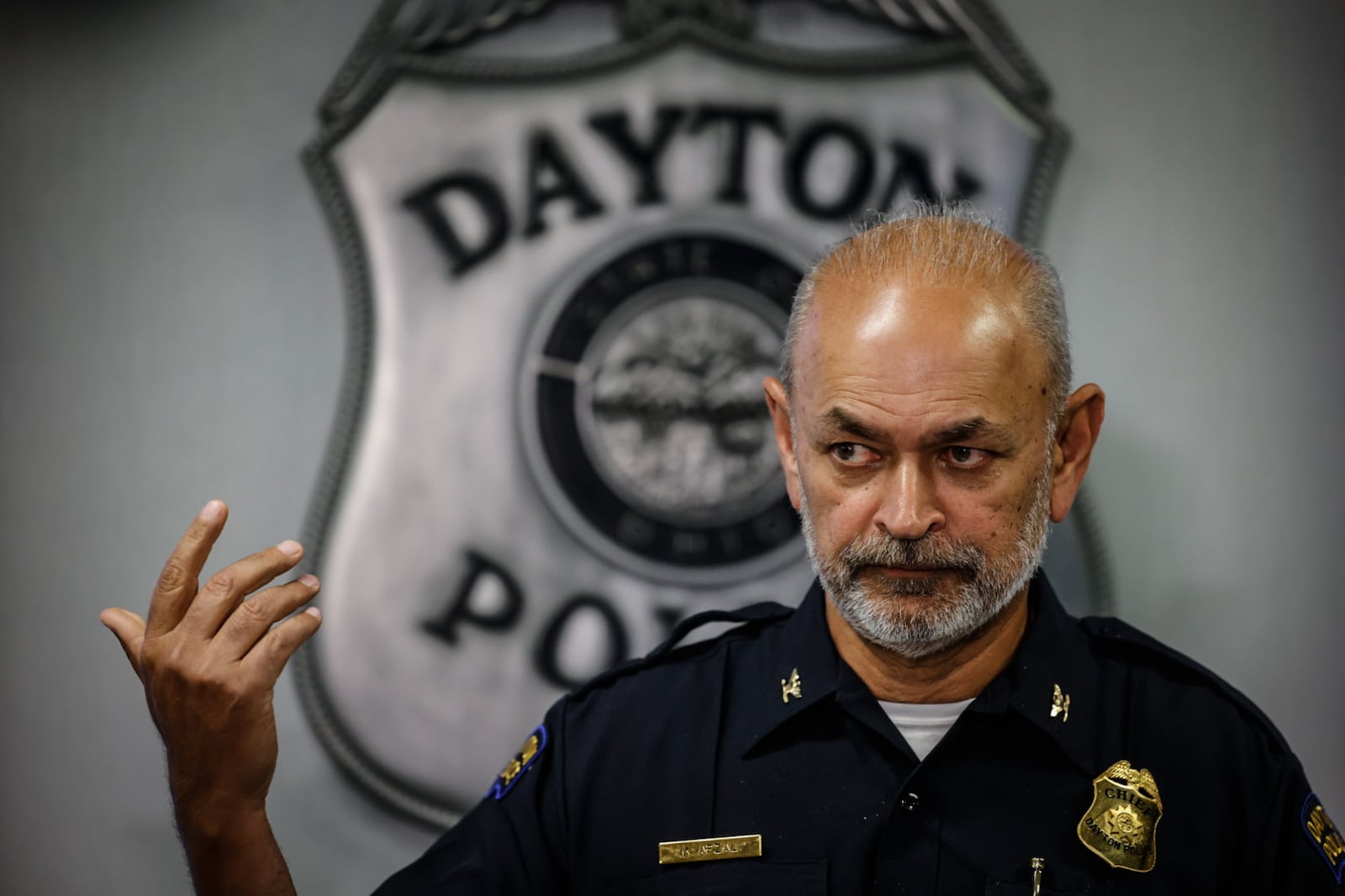 Dayton police chief Kamran Afzal goes over the timeline of the officer involved shooting that happened on North Broadway Street Sunday. JIM NOELKER/STAFF