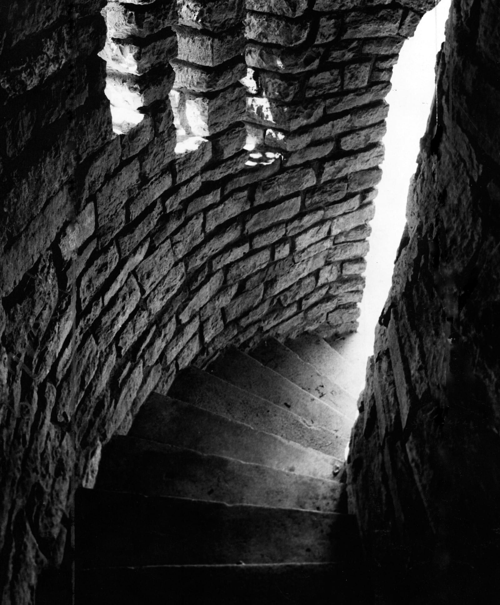 A winding stairway inside Lookout Tower at Hills & Dales MetroPark photographed in 1962. The caption from the time reads "A lovely winding stairway in the tower must be guarded by an iron gate after dark. The gate has been up three years and kept vandalism to a minimum." DAYTON DAILY NEWS / WRIGHT STATE UNIVERSITY SPECIAL COLLECTIONS 