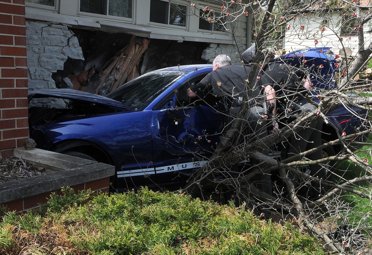 Car Runs into House