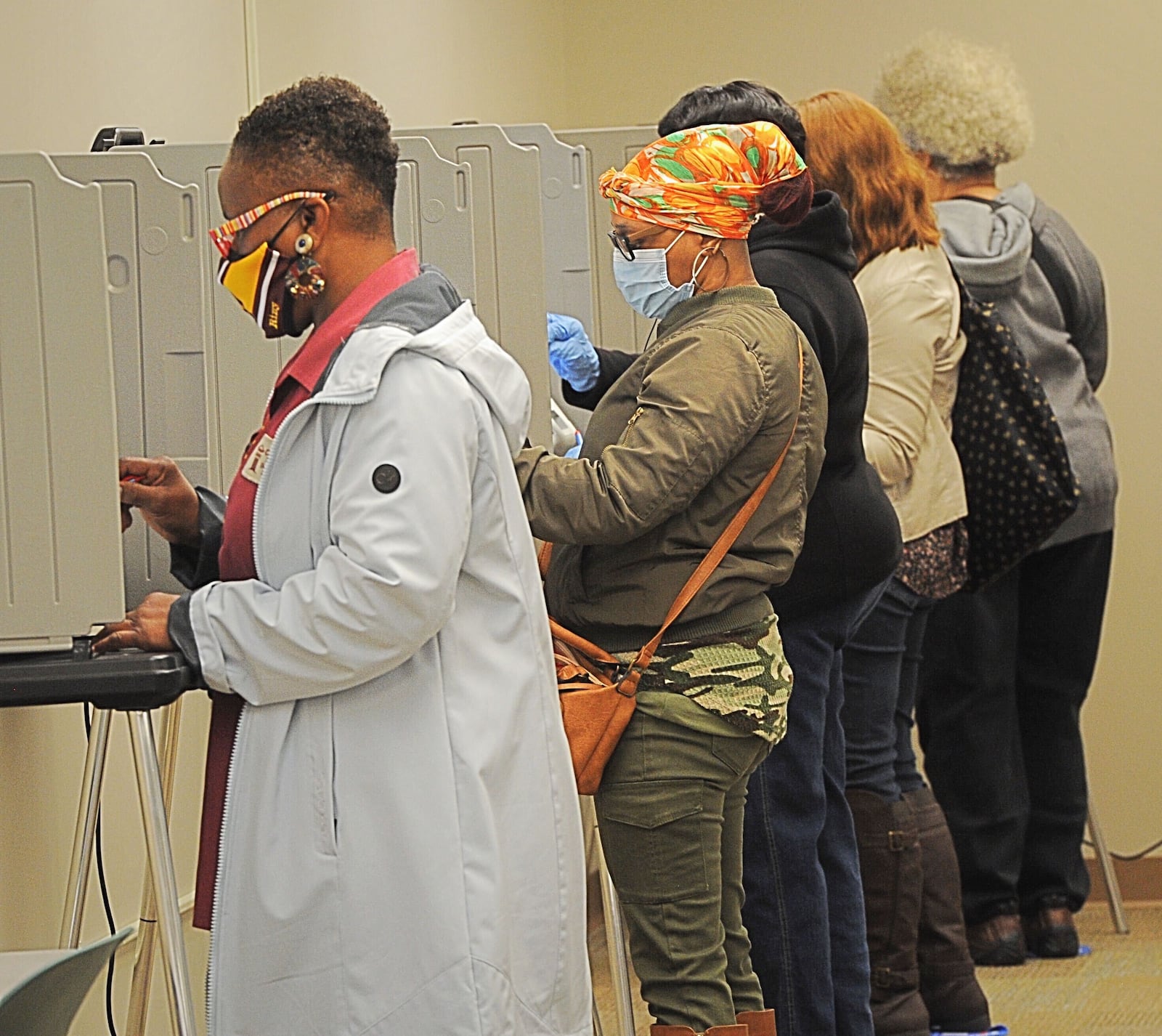 Long lines greeted voters at the Montgomery County Board of Elections on Tuesday, Oct. 6, 2020, as early voting began for the November general election. Early in-person voting in the state lasts until Nov. 2 and absentee ballots can be dropped off at the board office until Election Day, which is Nov. 3. In Montgomery County, registered voters can cast their ballot at the board of elections located at 451 W. Third St. in Dayton. MARSHALL GORBY/STAFF