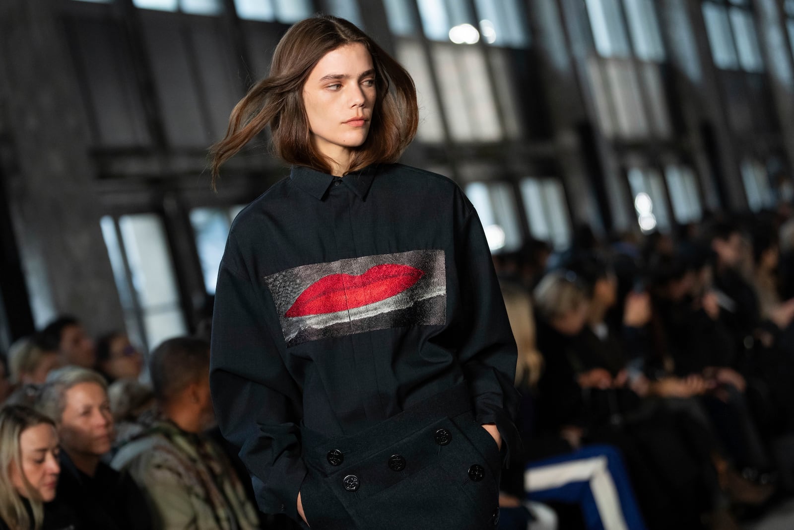 A model wears a creation as part of the Sacai Fall/Winter 2025-2026 Womenswear collection presented in Paris, Monday, March 10, 2025. (Photo by Scott A Garfitt/Invision/AP)