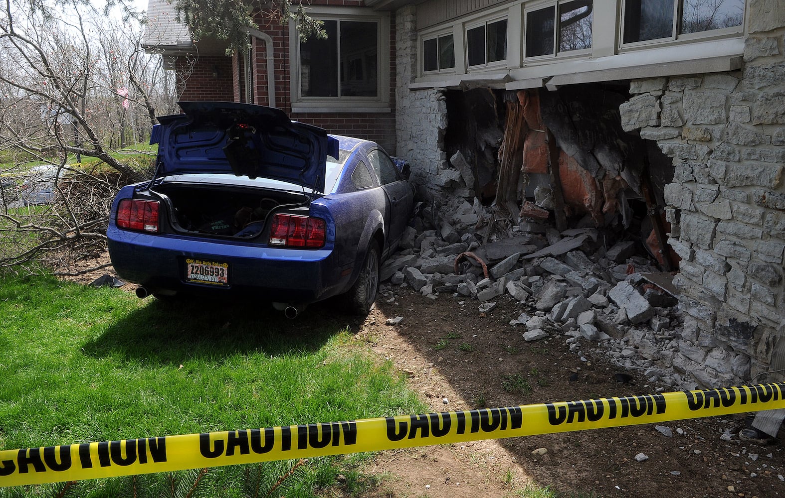 Car Runs into House