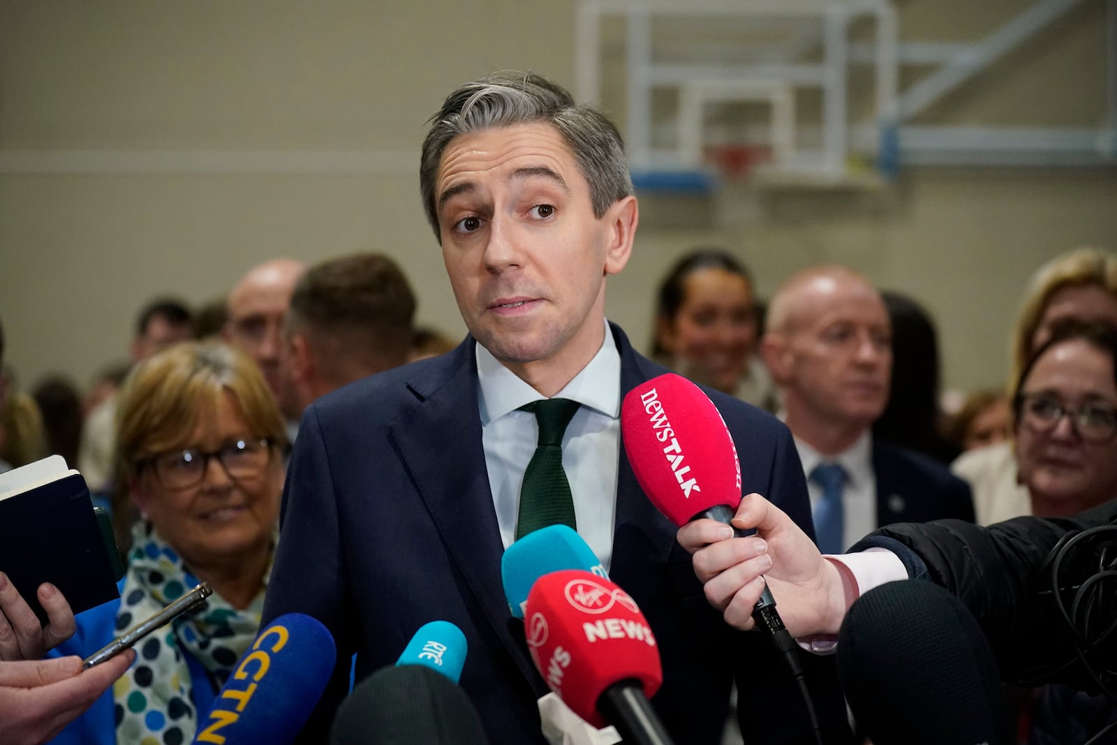 Taoiseach and Fine Gael leader Simon Harris speaks to the media as he arrives at the election count centre at Shoreline Leisure Greystones in Co Wicklow, after the General Election, Saturday, Nov. 30, 2024. (Niall Carson/PA via AP)