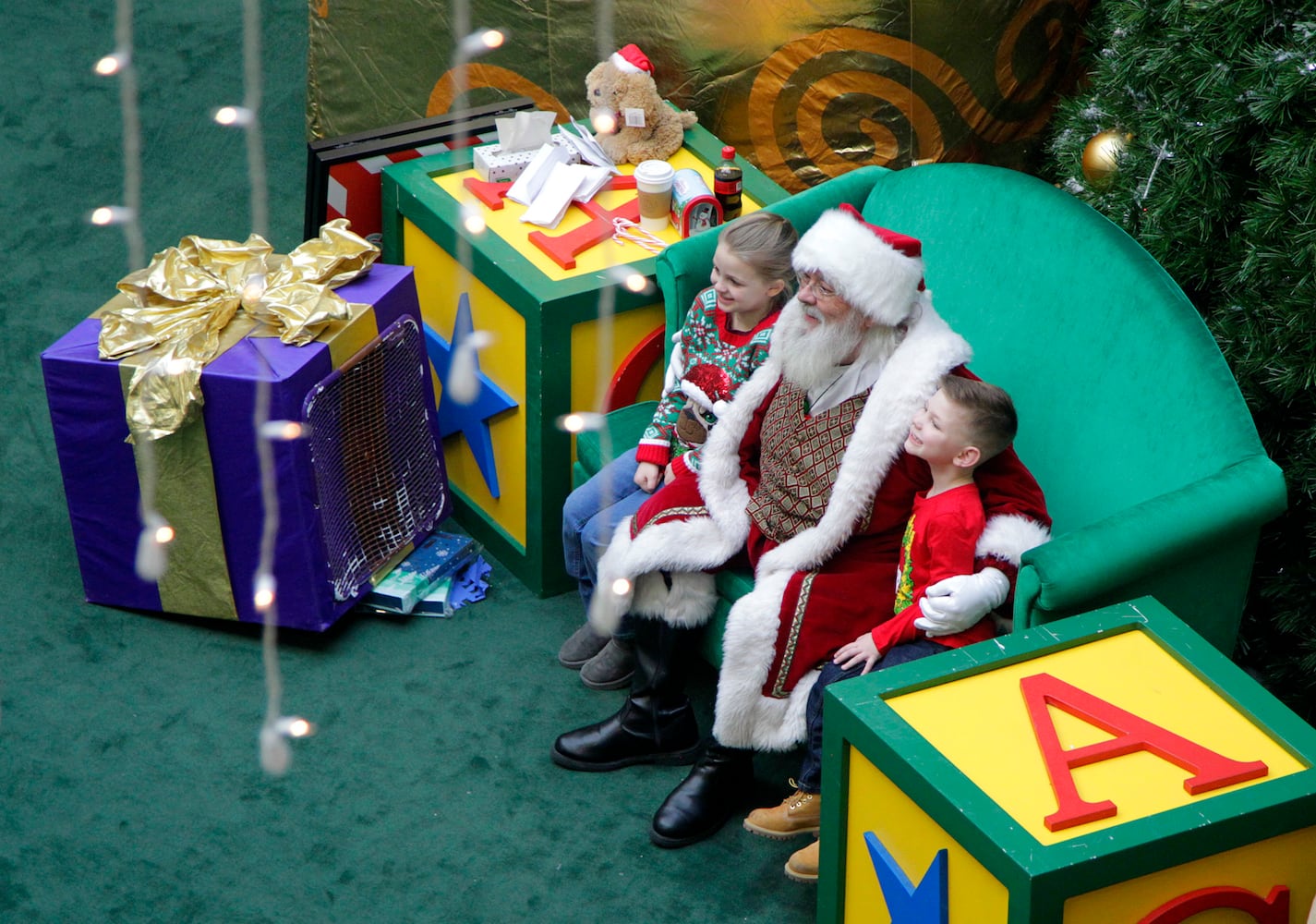 PHOTOS: A visit with Santa Claus makes the holiday season magical