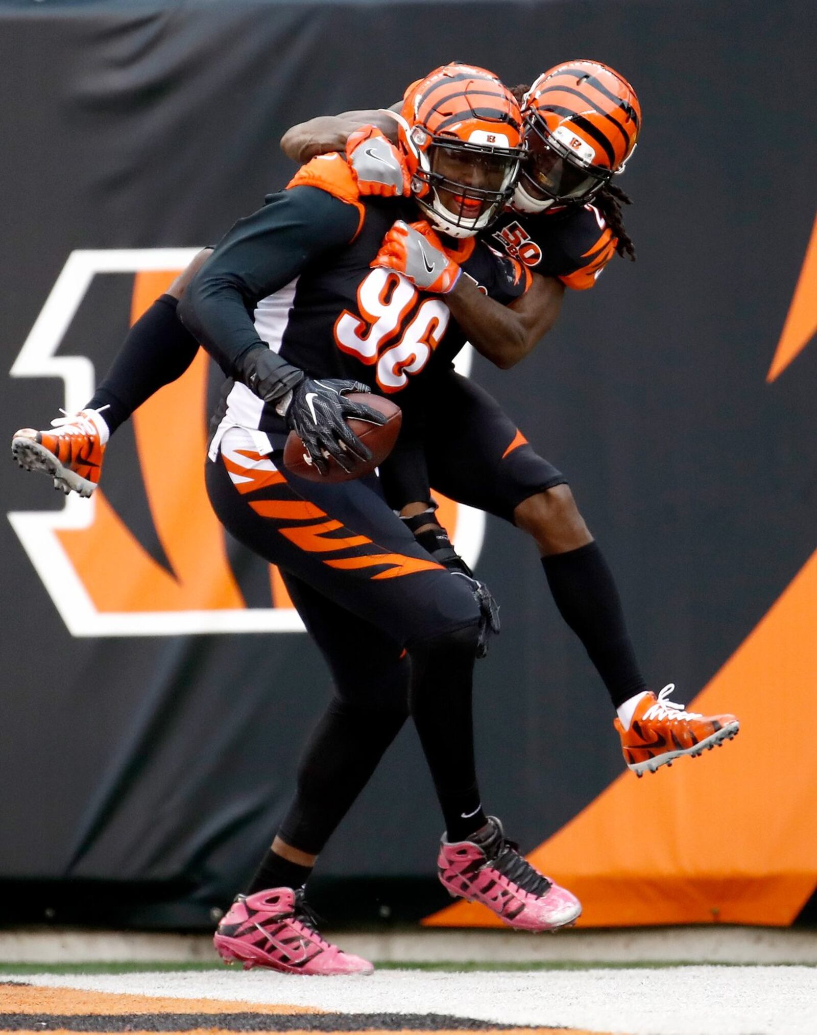 CINCINNATI, OH - OCTOBER 29: Carlos Dunlap #96 and Dre Kirkpatrick #27 of the Cincinnati Bengals celebrate after Dunlap returned an interception for a touchdown against the Indianapolis Colts at Paul Brown Stadium on October 29, 2017 in Cincinnati, Ohio. (Photo by Andy Lyons/Getty Images)