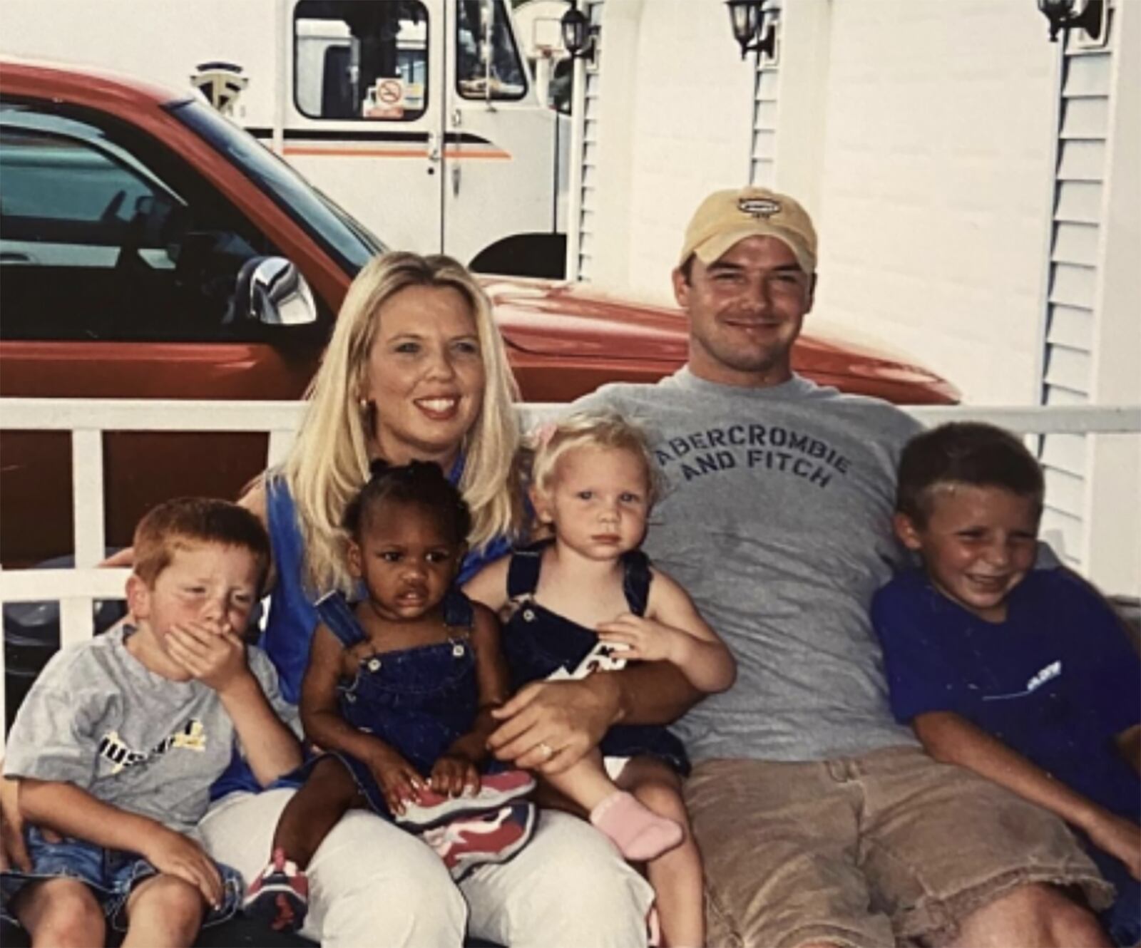 The Salazar family shortly after formerly adopting Lexi (on Heather's lap) in 2004. Left to right: Caleb, Lexi, Heather, Cara, Steve and Christian Salazar.