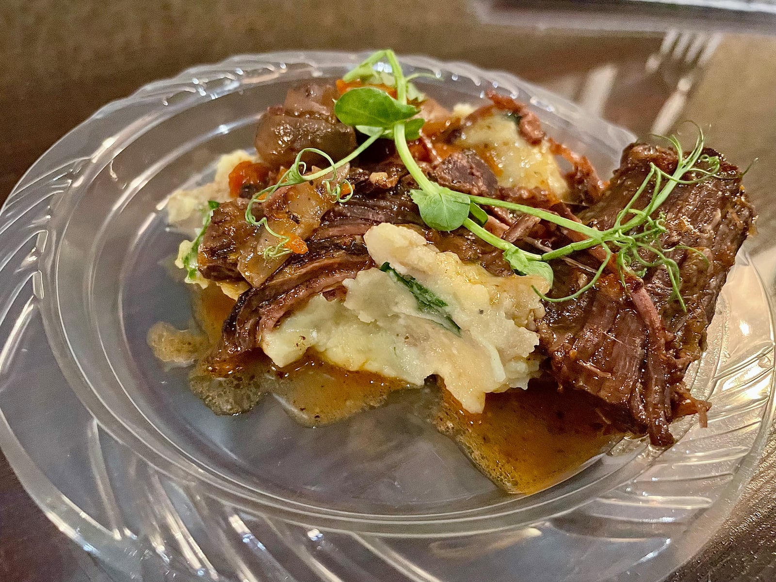 The Miami Valley Restaurant Association’s Sneak Peek to Winter Restaurant Week at The Steam Plant in Dayton featured 12 establishments serving unique dishes for foodies to try. Pictured is Beef Bourguignon and Mashed Potatoes from Manna in Centerville. NATALIE JONES/STAFF