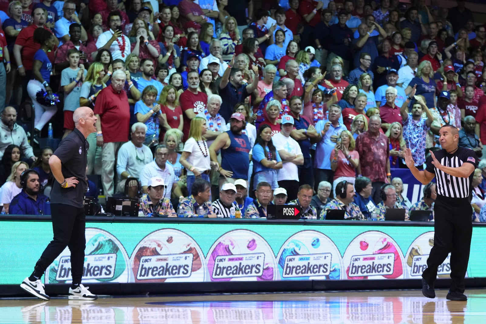 UConn head coach Dan Hurley yells at an official during the second half of an NCAA college basketball game against Dayton at the Maui Invitational Wednesday, Nov. 27, 2024, in Lahaina, Hawaii. (AP Photo/Lindsey Wasson)