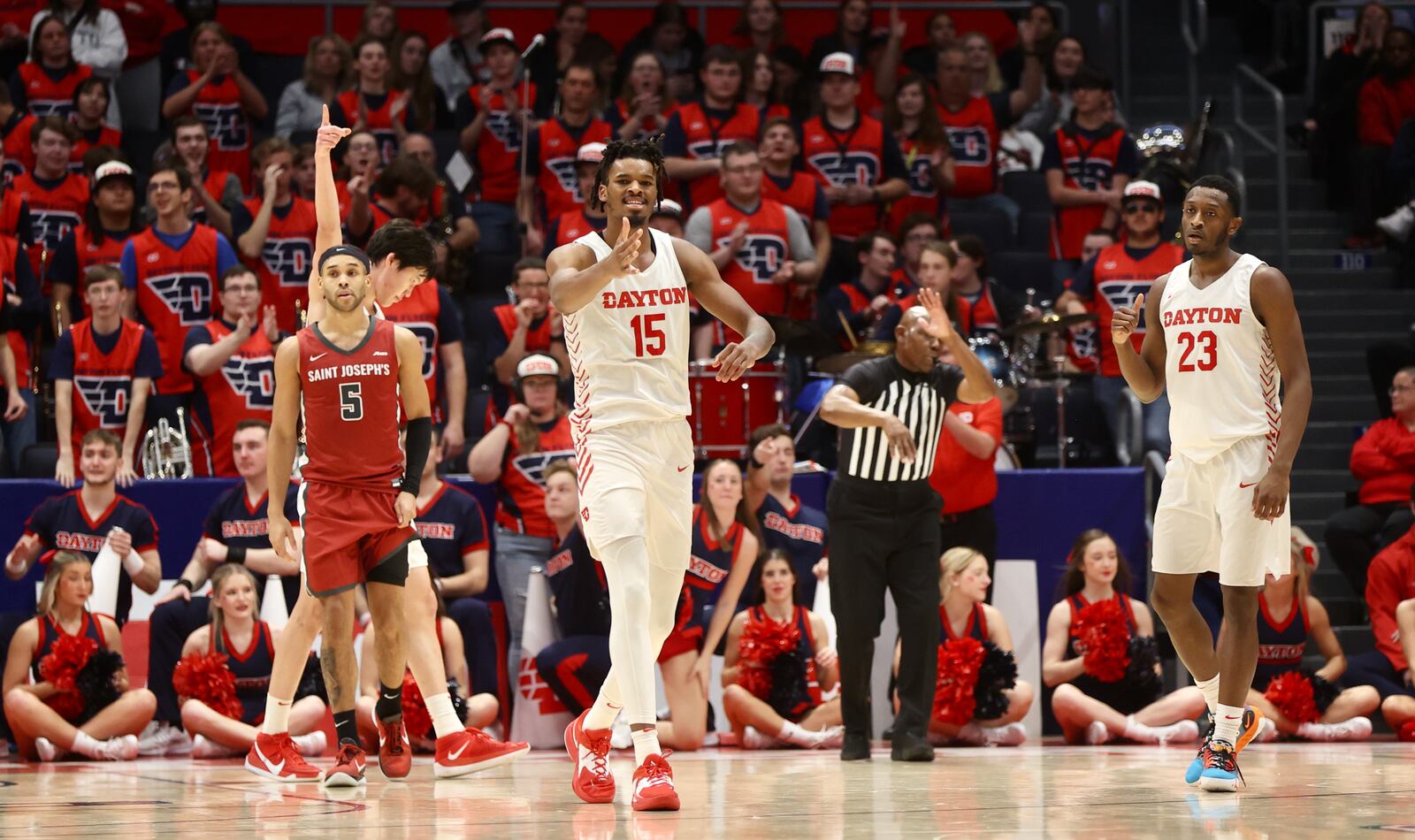 Dayton's DaRon Holmes II celebrates a defensive stop against Saint Joseph’s on Wednesday, Jan. 4, 2023, at UD Arena. David Jablonski/Staff