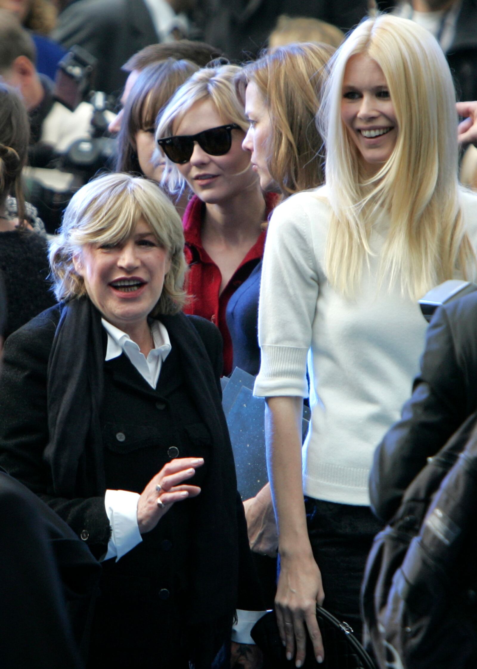 FILE - British singer Marianne Faithfull, left, U.S. actress Kirsten Dunst, center with sunglasses, and German model Claudia Schiffer attend the Chanel's Spring-Summer 2008 ready-to-wear fashion collection designed by German fashion designer Karl Lagerfeld and presented in Paris, Friday Oct. 5, 2007. (AP Photo/Remy de la Mauviniere, File)