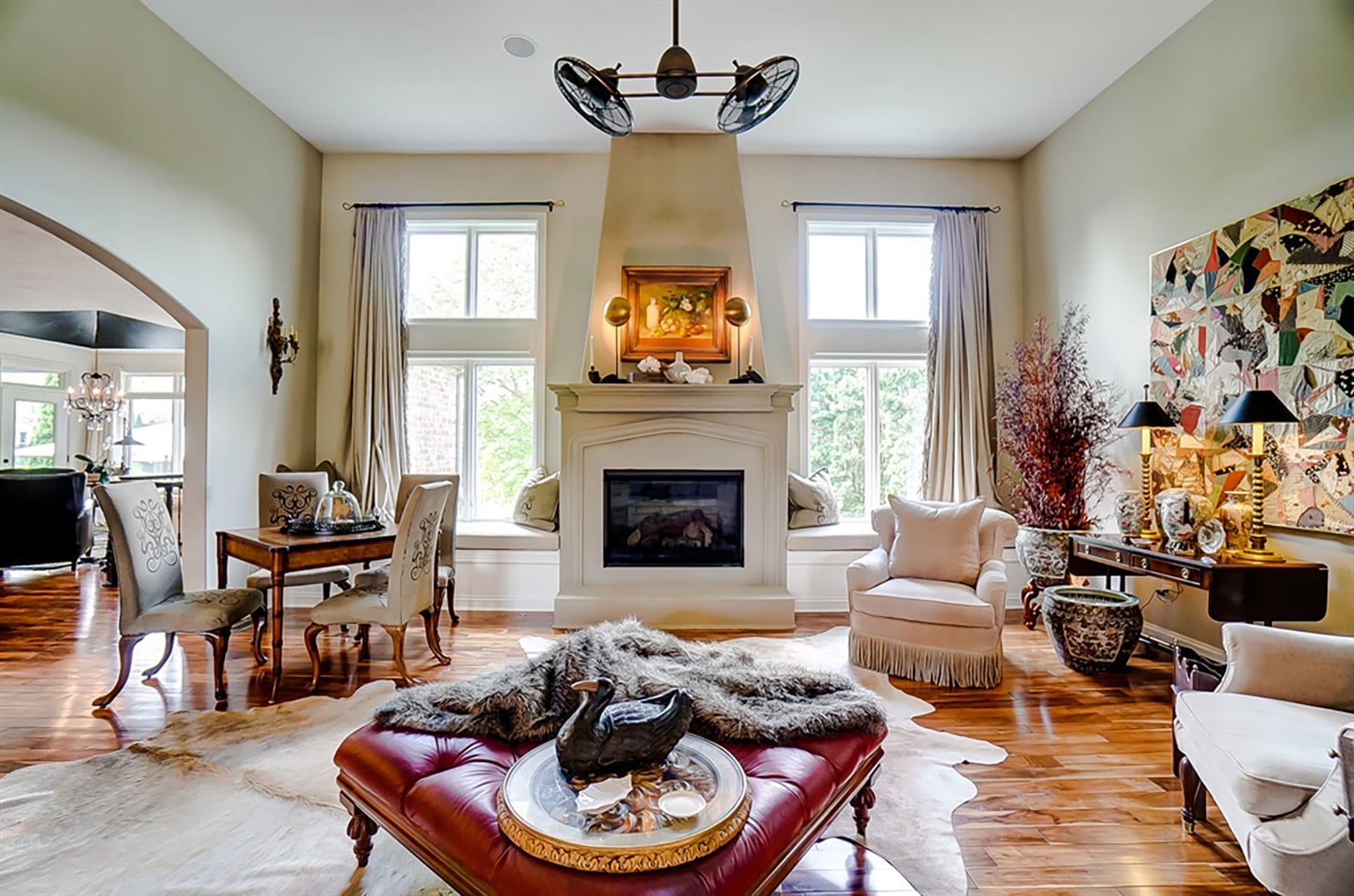 Straight off the foyer is the great room with a fireplace as its centerpiece. The gas fireplace has a raised hearth and double wood mantel. Tall windows with window seats flank the fireplace. An arched walkway leads into the kitchen and breakfast room. CONTRIBUTED PHOTO