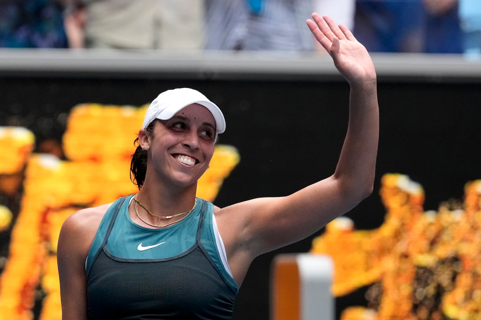 Madison Keys of the U.S. celebrates after defeating Elena Rybakina of Kazakhstan in their fourth round match at the Australian Open tennis championship in Melbourne, Australia, Monday, Jan. 20, 2025. (AP Photo/Manish Swarup)