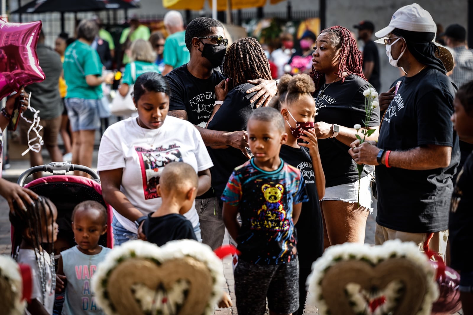 A group gathers on Fifth Street in the Oregon District to honor the nine lives lost two years ago, on Aug. 4, 2019, on the second anniversary of the Dayton mass shooting. Jim Noelker/Staff