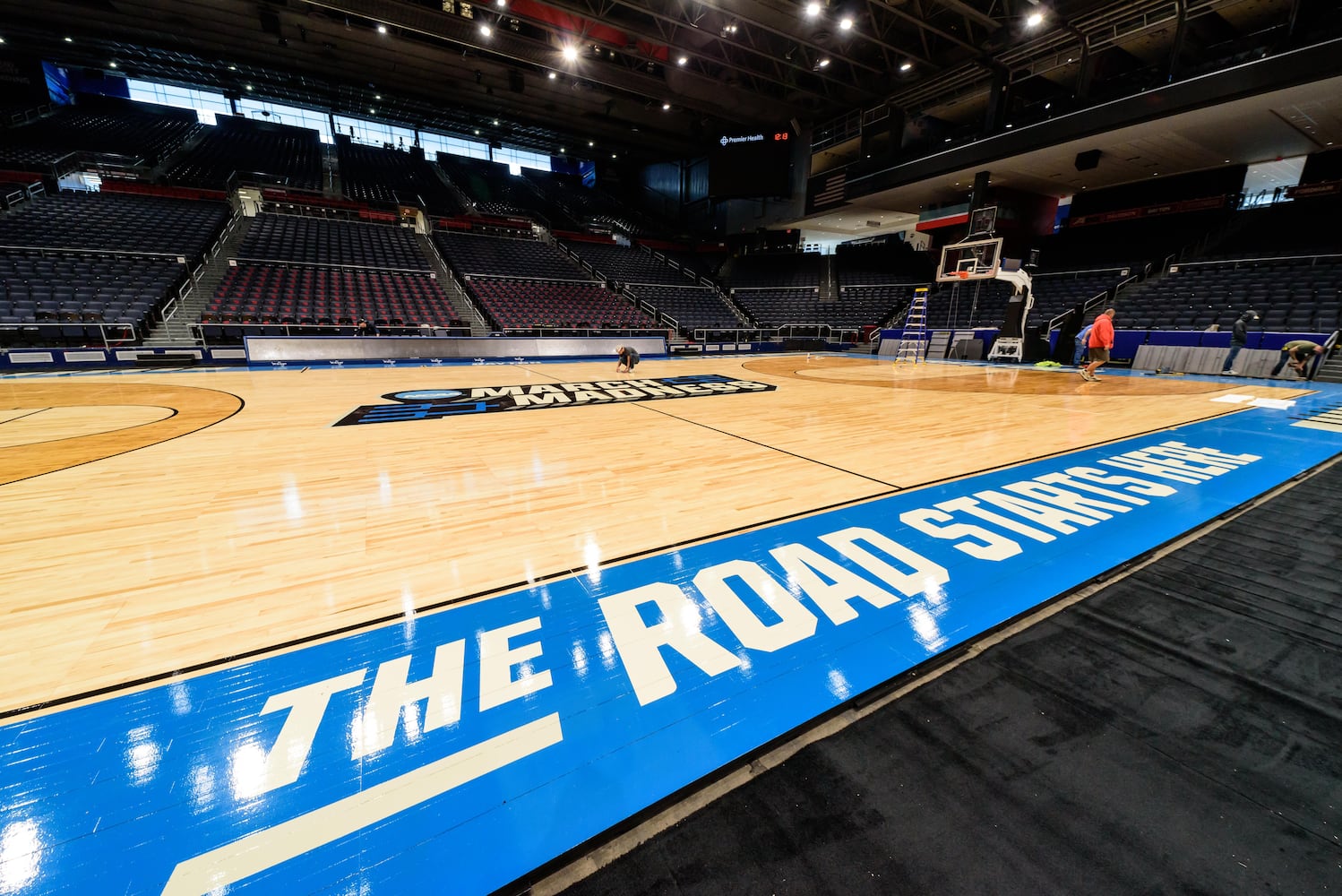 PHOTOS: NCAA First Four basketball court installation at UD Arena