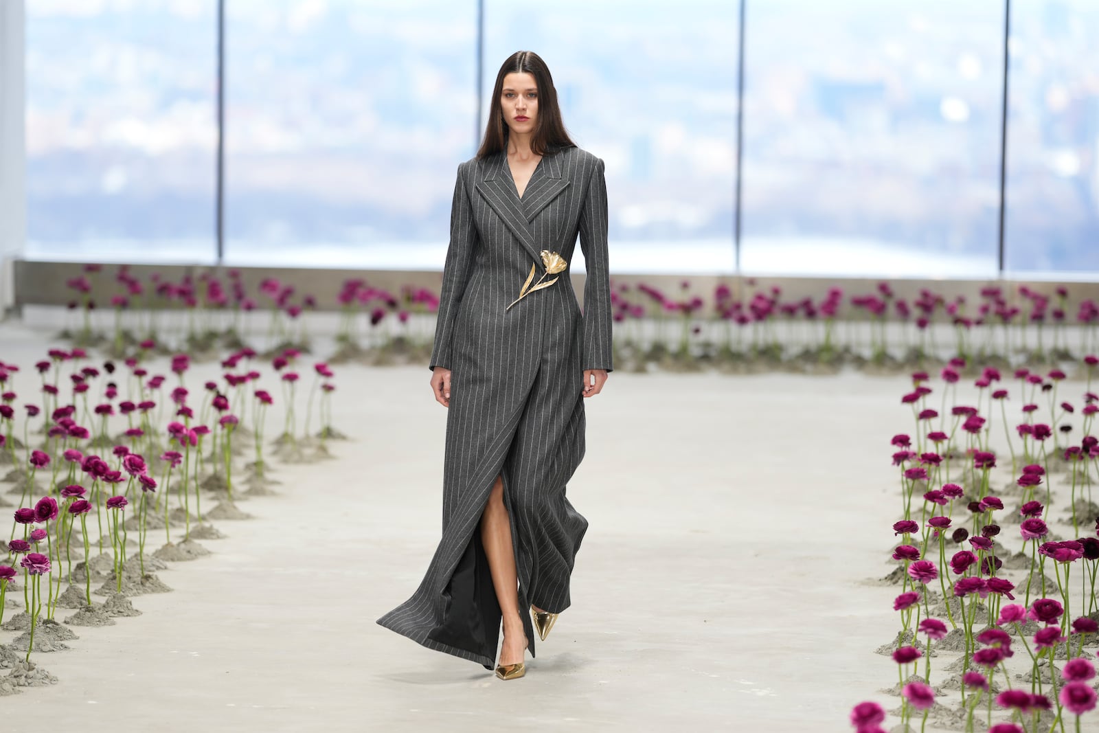 A model walks the runway during the Carolina Herrera Fall/Winter 2025 fashion show as part of New York Fashion Week on Monday, Feb. 10, 2025, in New York. (Photo by Charles Sykes/Invision/AP)