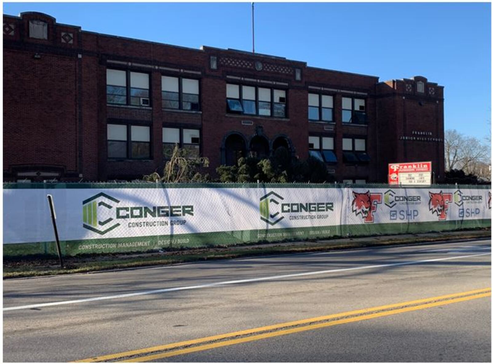 A crew from Green City Demolition works at demolishing the southeast corner of Franklin Junior High School on Wednesday. The 100-year-old building is being torn down to make way for the new Franklin High School campus. The demolition is expected to be completed by early January. ED RICHTER/STAFF