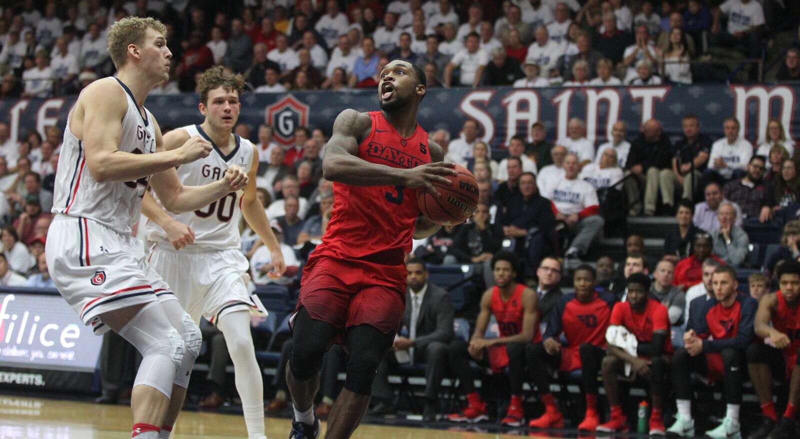 Dayton’s Trey Landers drives to the basket against Saint Mary's on Tuesday, Dec. 19, 2017, at McKeon Pavilion in Moraga, Calif.