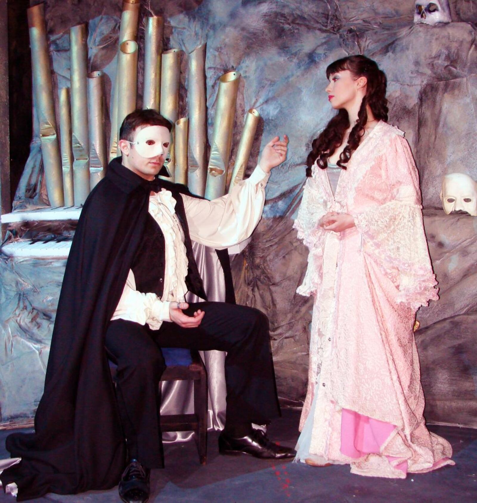 Matthew Wade (Phantom/Erik) and Lily Autumn Page (Christine) in La Comedia Dinner Theatre's production of "Phantom." PHOTO BY JUSTIN WALTON